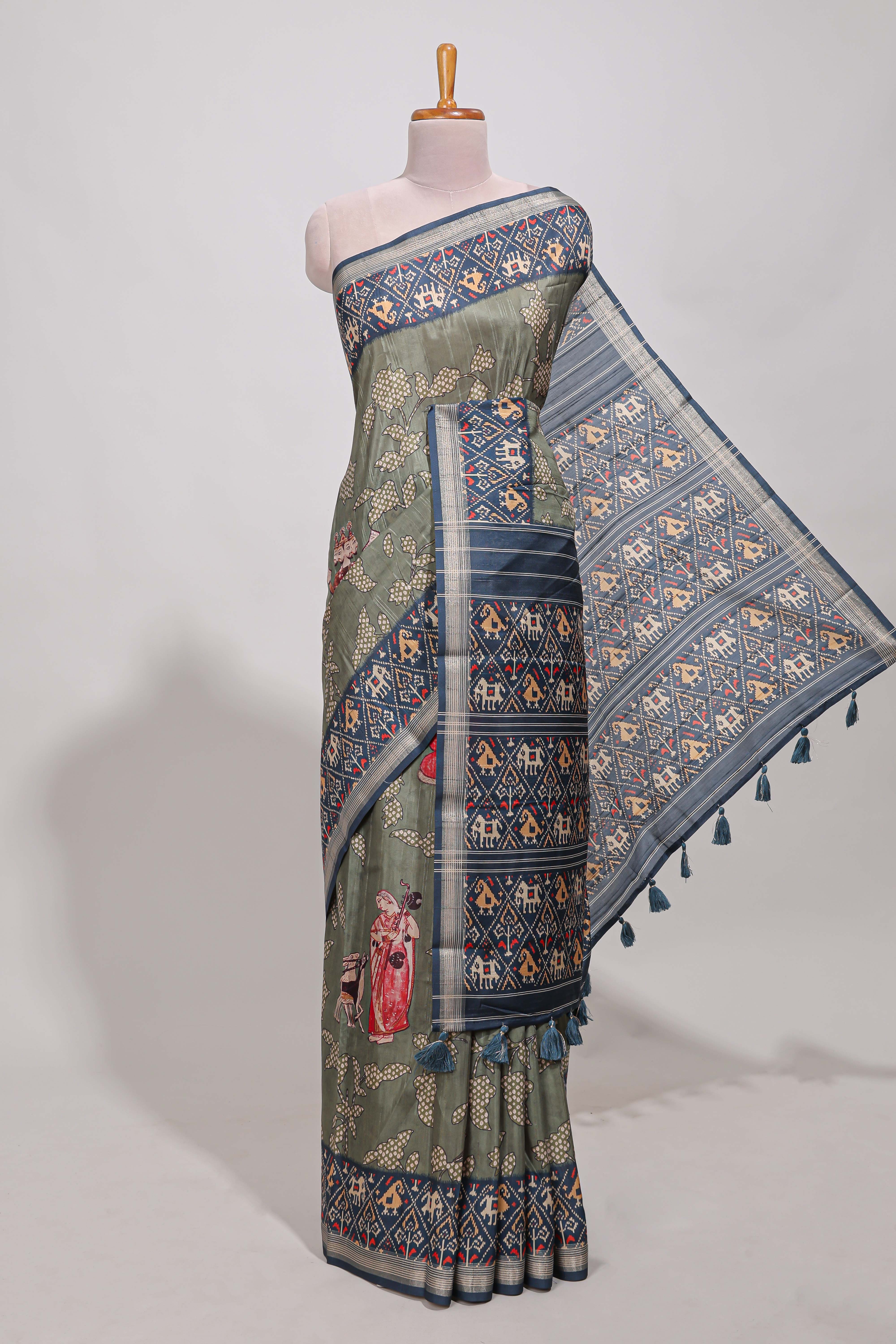 Olive green patola and pichwai tussar saree zari bordergeomatricmatching pallu along with tussels