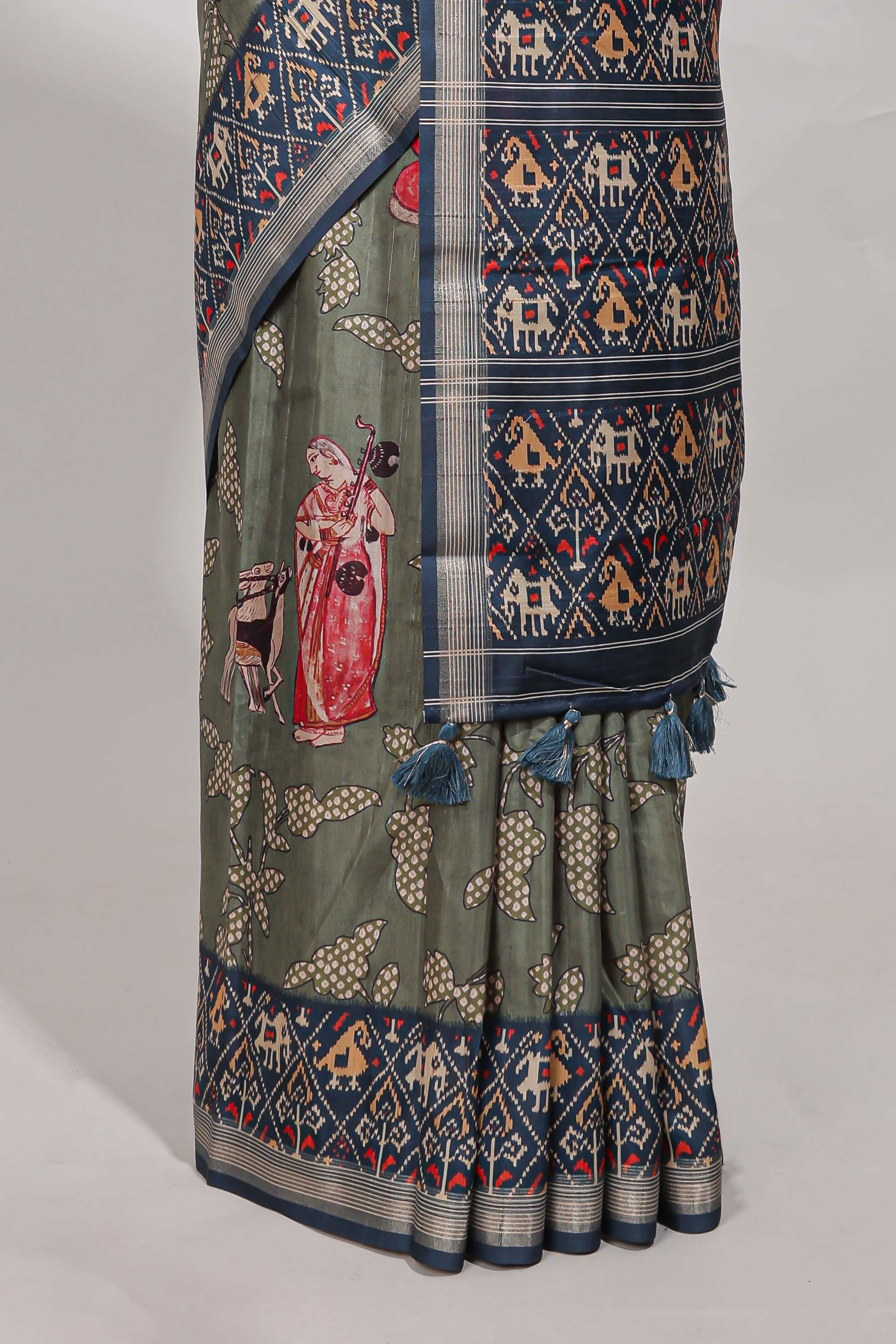 Olive green patola and pichwai tussar saree zari bordergeomatricmatching pallu along with tussels