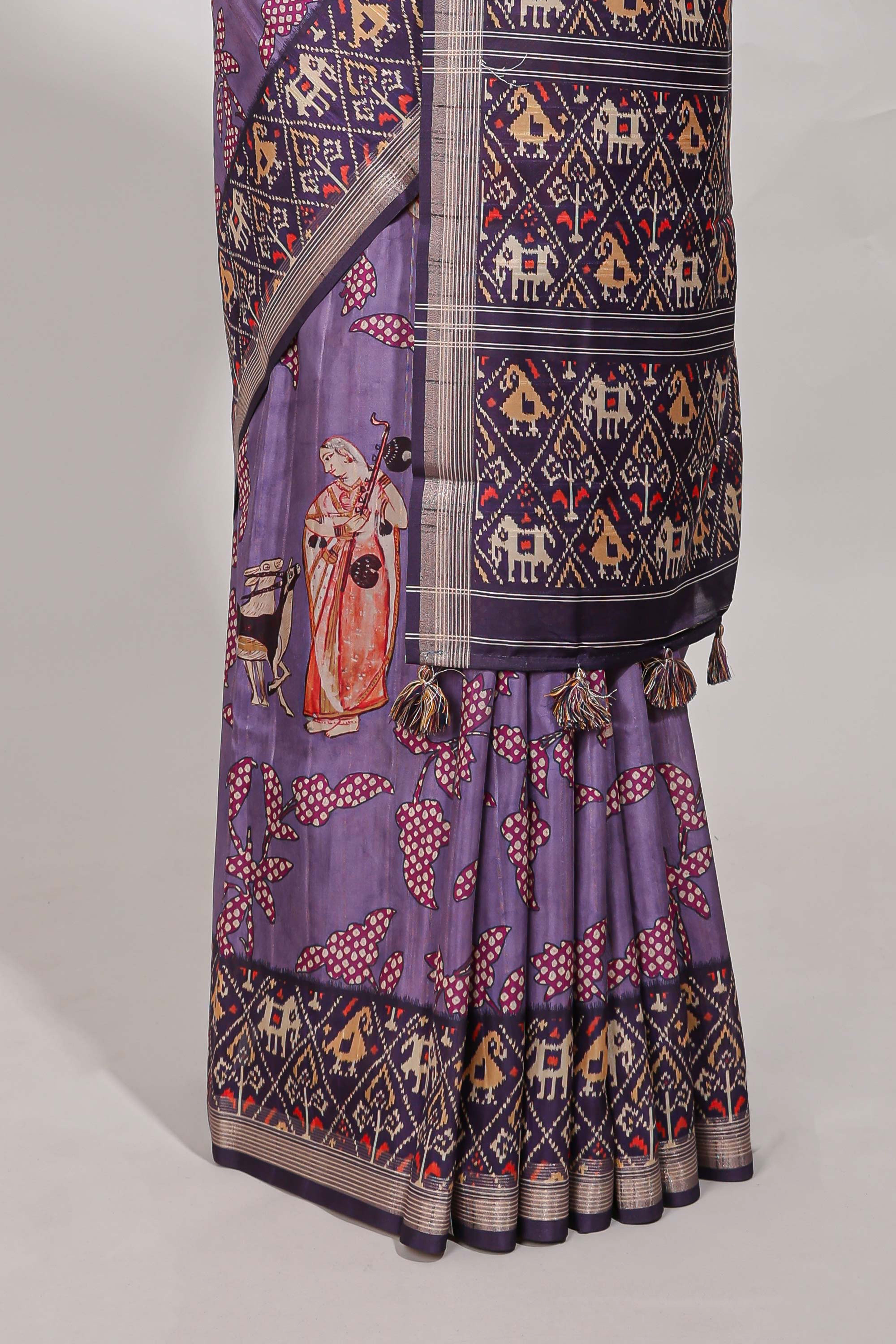 Violetpatola and pichwai tussar saree zari bordergeomatricmatching pallu along with tussels