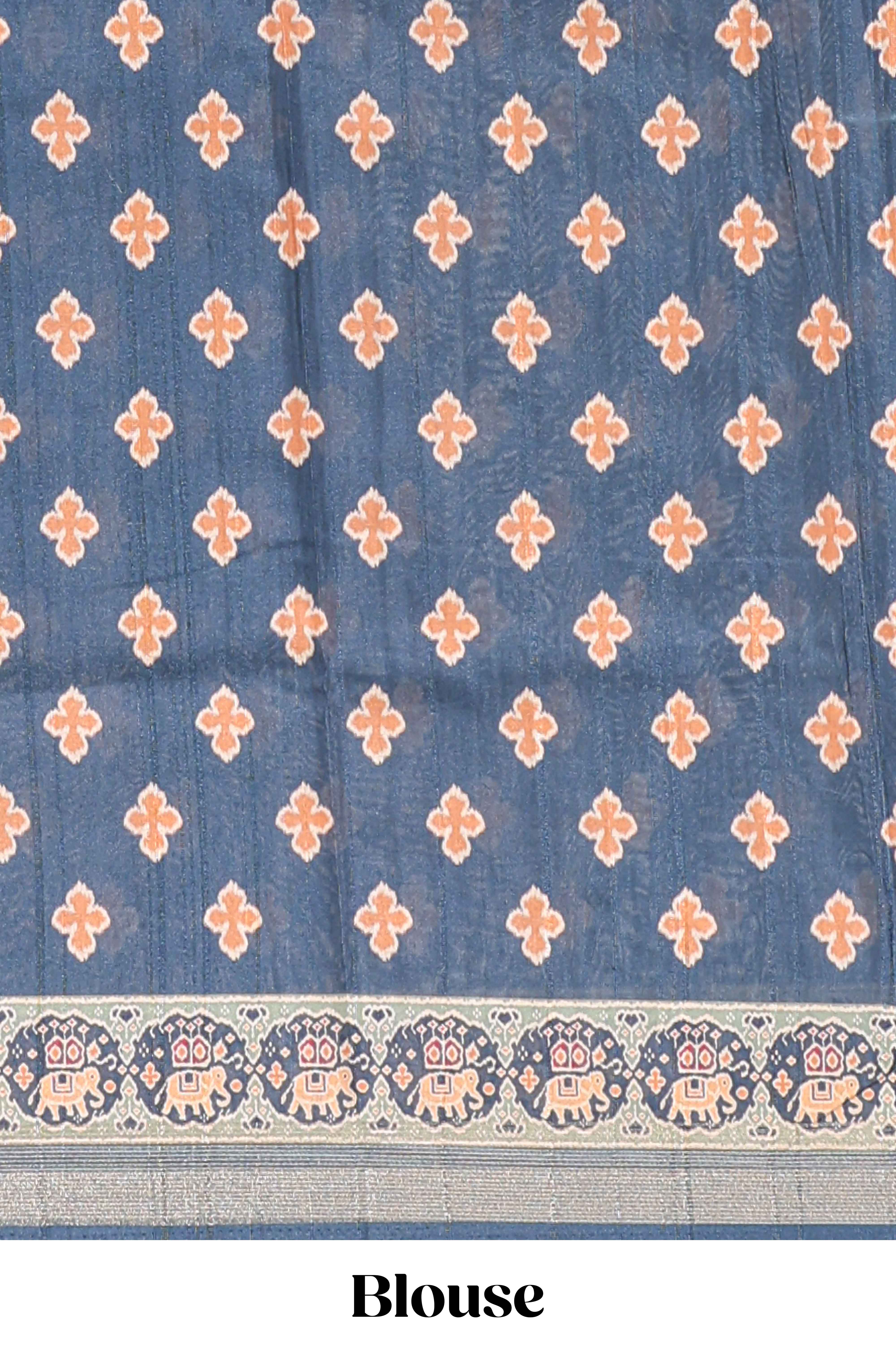 Blue patolatussar saree pichwai art and peacock motifs elephant designs with rich matching pallu along with tussels