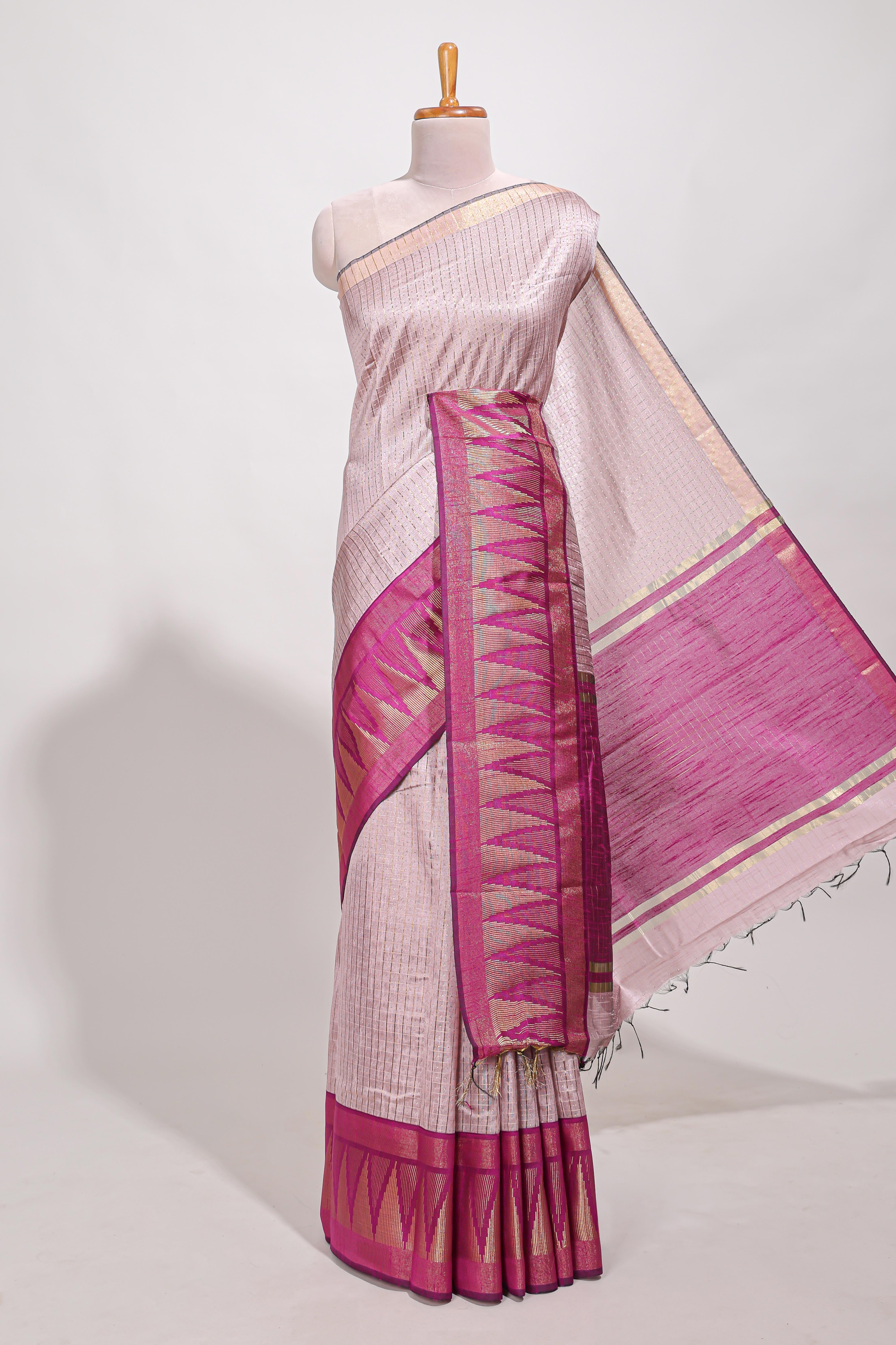 Peach semi tussar sareeall-over fine checked zari with border geometric zig-zag metallic weaving and contrast blouse
