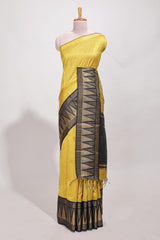 Yellow semi tussar sareeall-over fine checked zari with border geometric zig-zag metallic weaving and contrast blouse