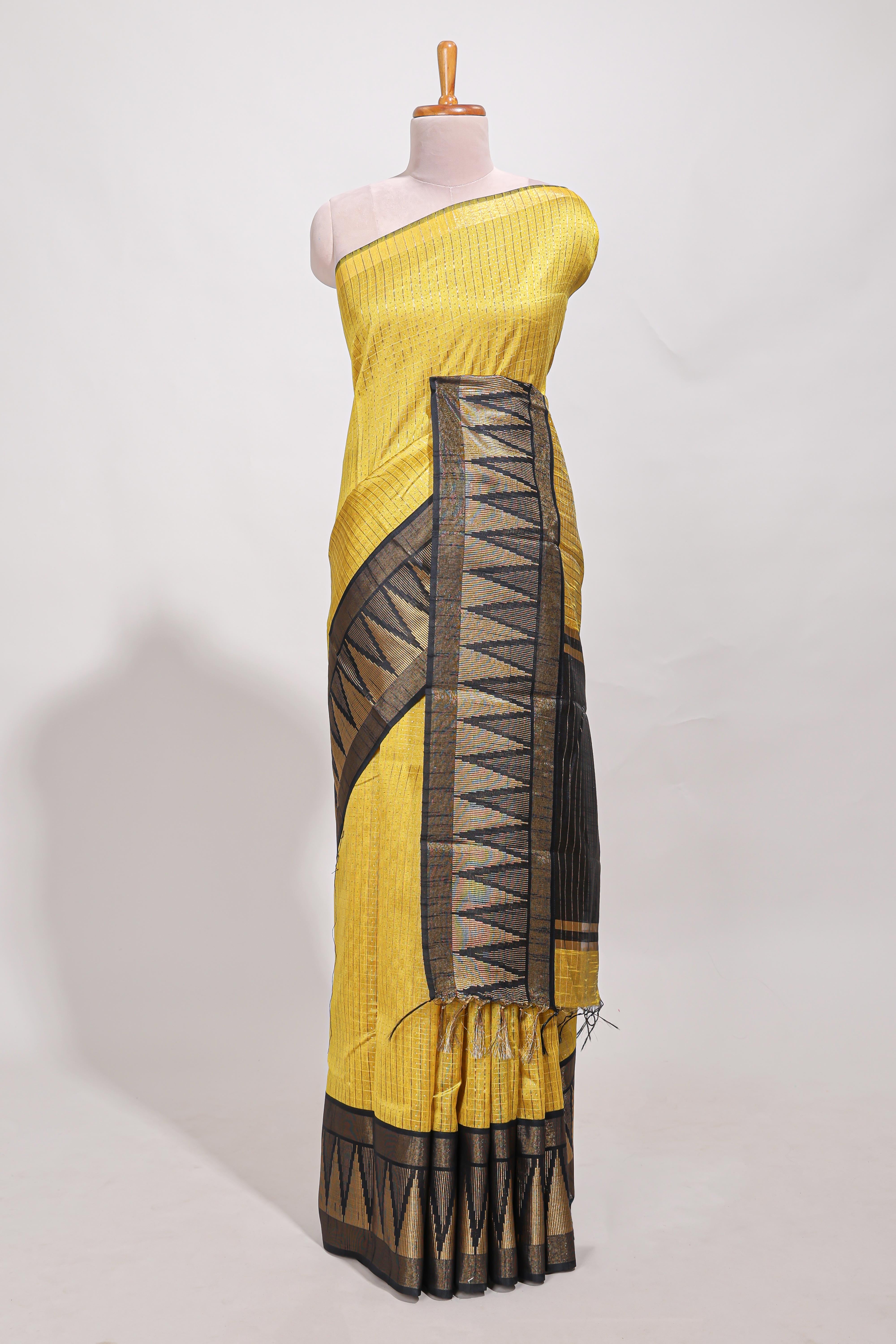 Yellow semi tussar sareeall-over fine checked zari with border geometric zig-zag metallic weaving and contrast blouse