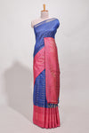 Rich royal blue silk body golden zari butta pattern and Broad golden zari border with contrast blouse