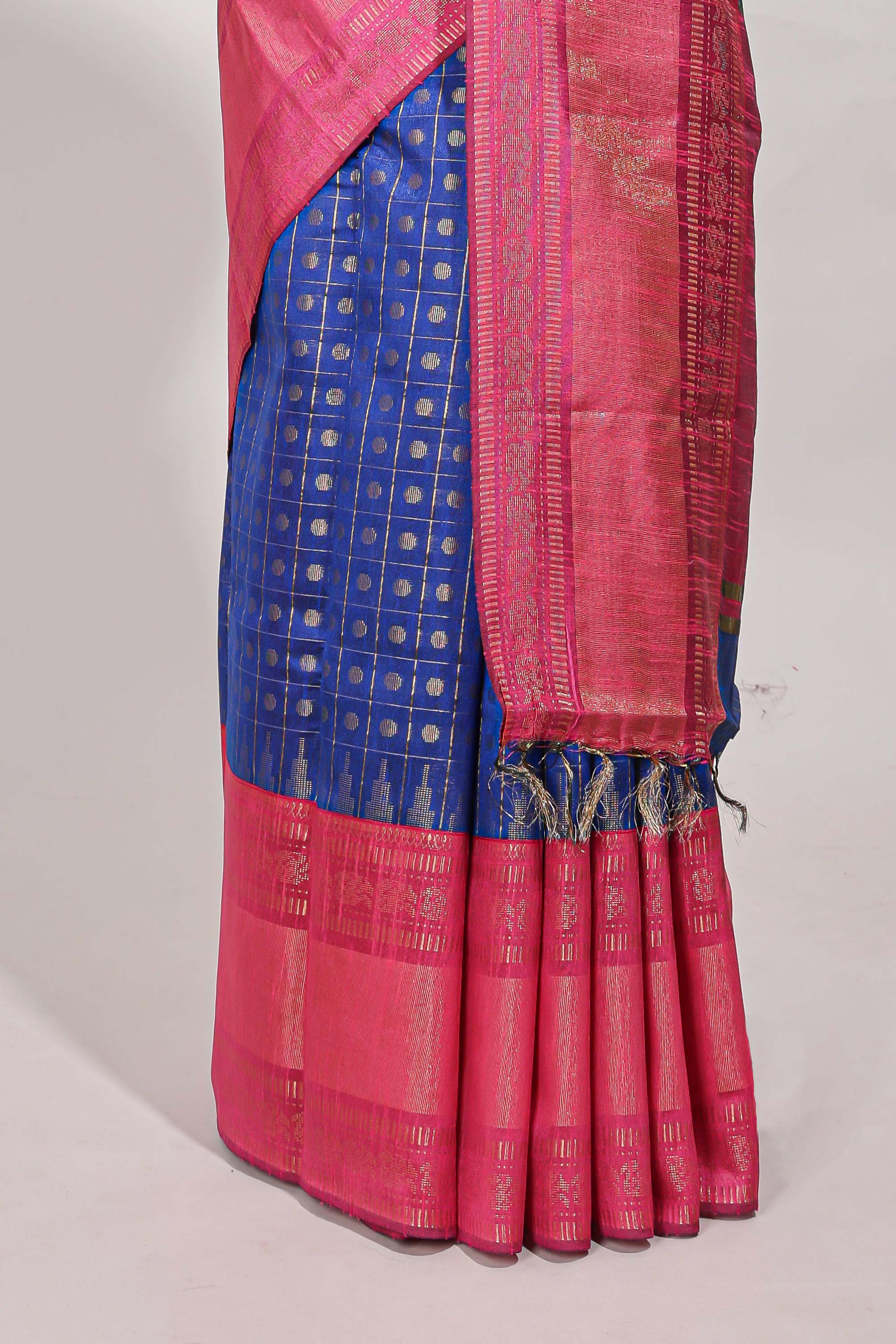 Rich royal blue silk body golden zari butta pattern and Broad golden zari border with contrast blouse
