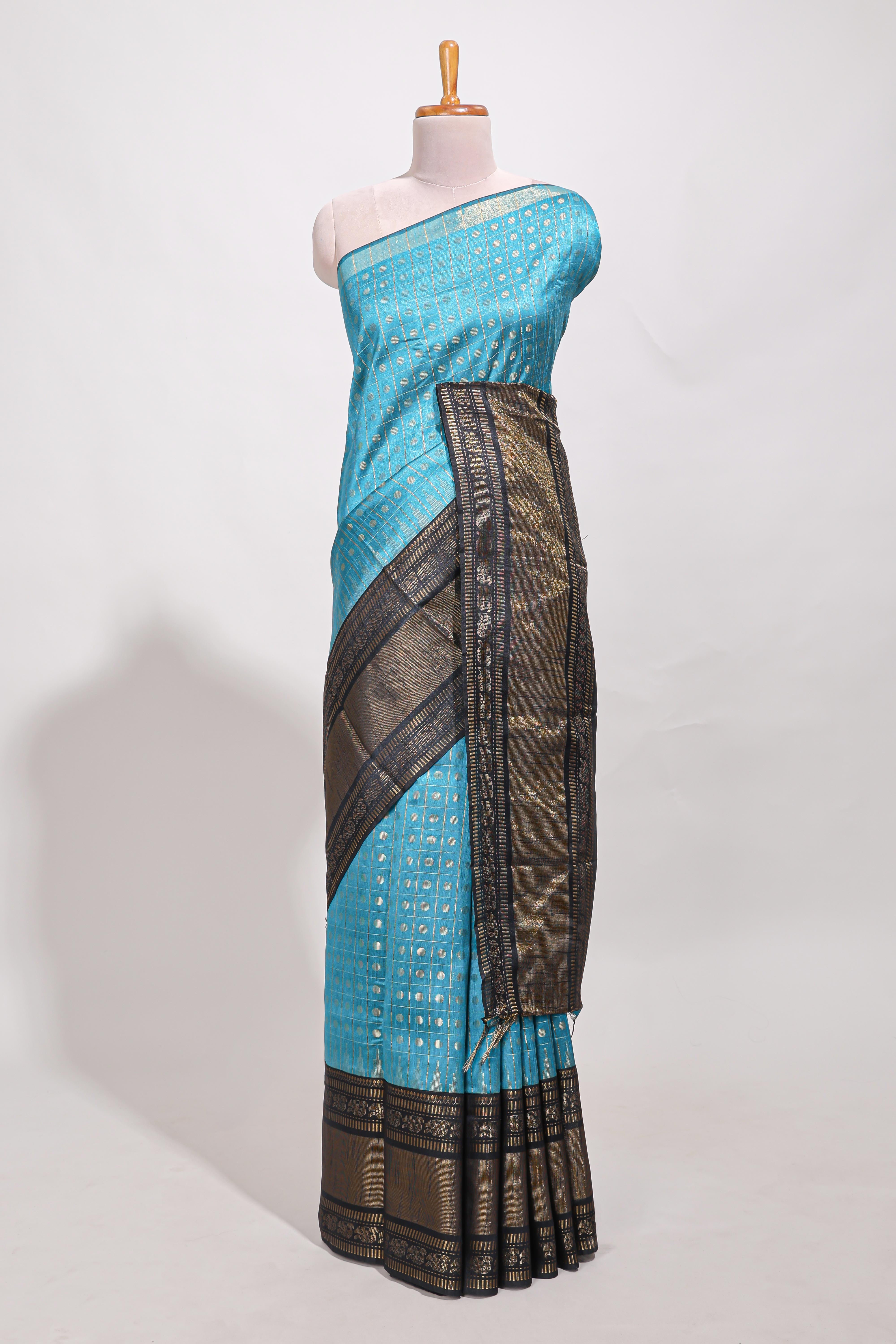 Blue silk body golden zari butta pattern and Broad golden zari border with contrast blouse