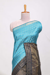 Blue silk body golden zari butta pattern and Broad golden zari border with contrast blouse