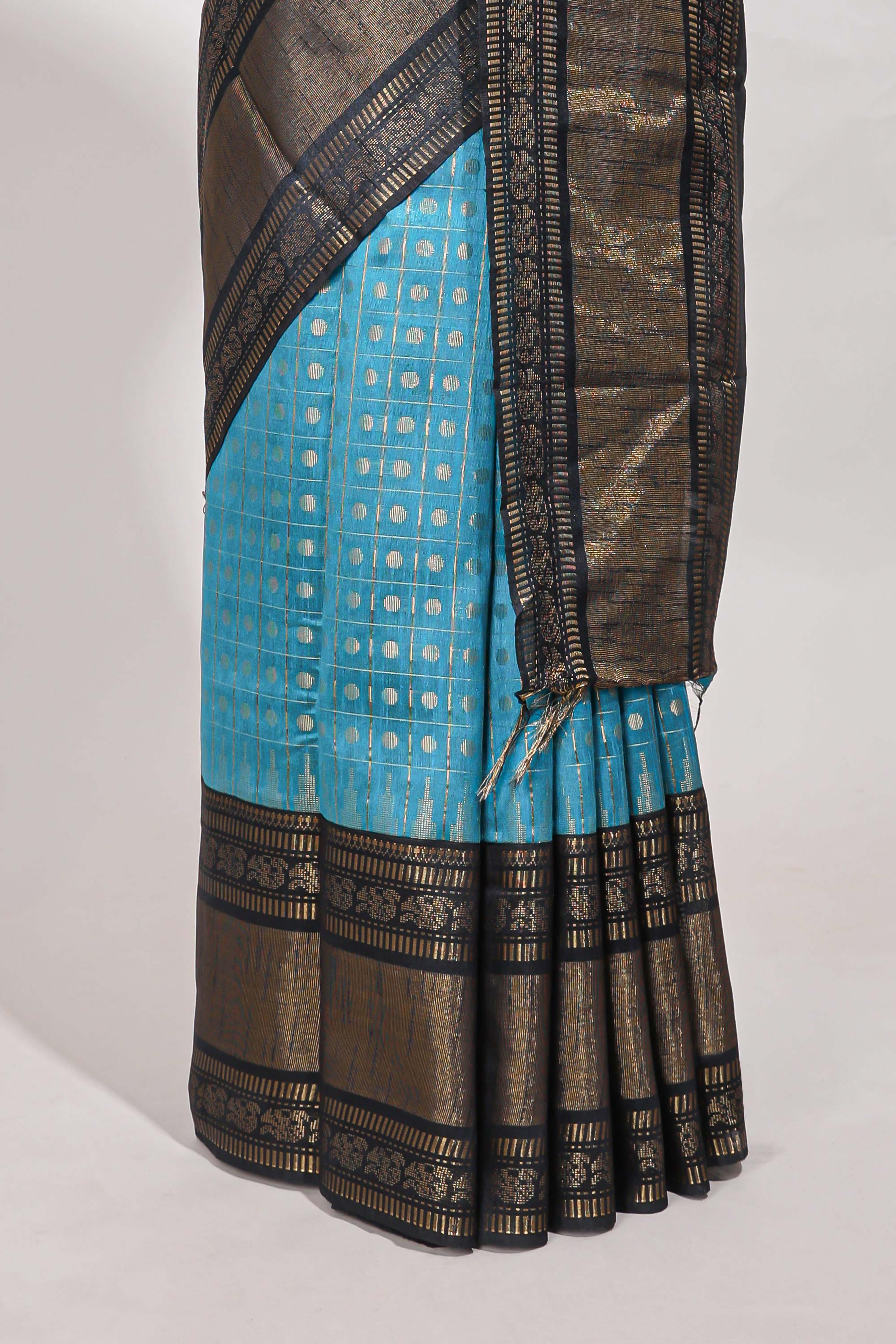 Blue silk body golden zari butta pattern and Broad golden zari border with contrast blouse