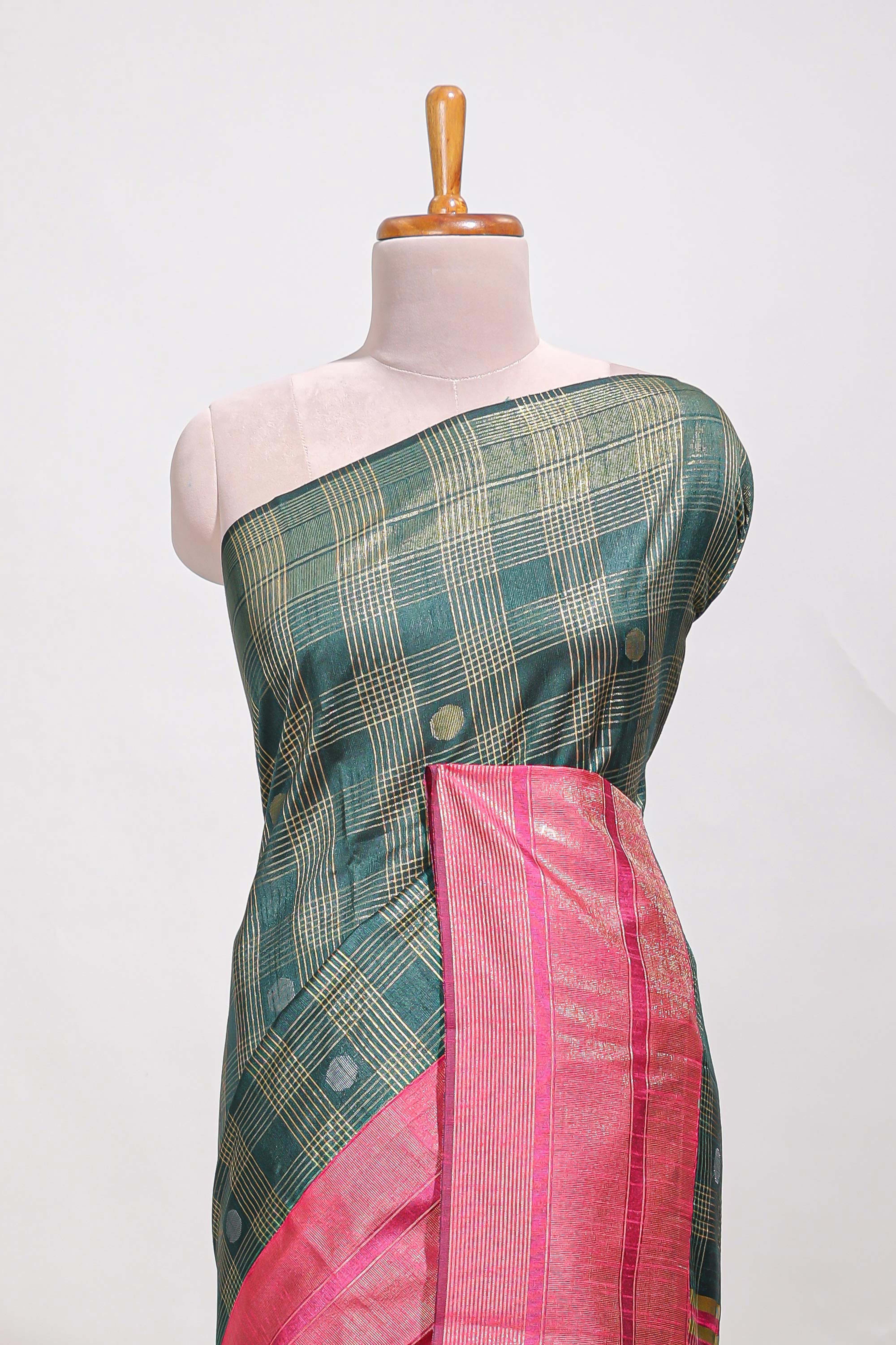 Dark green silk body golden zari butta striped pattern and Broad golden zari border with contrast blouse