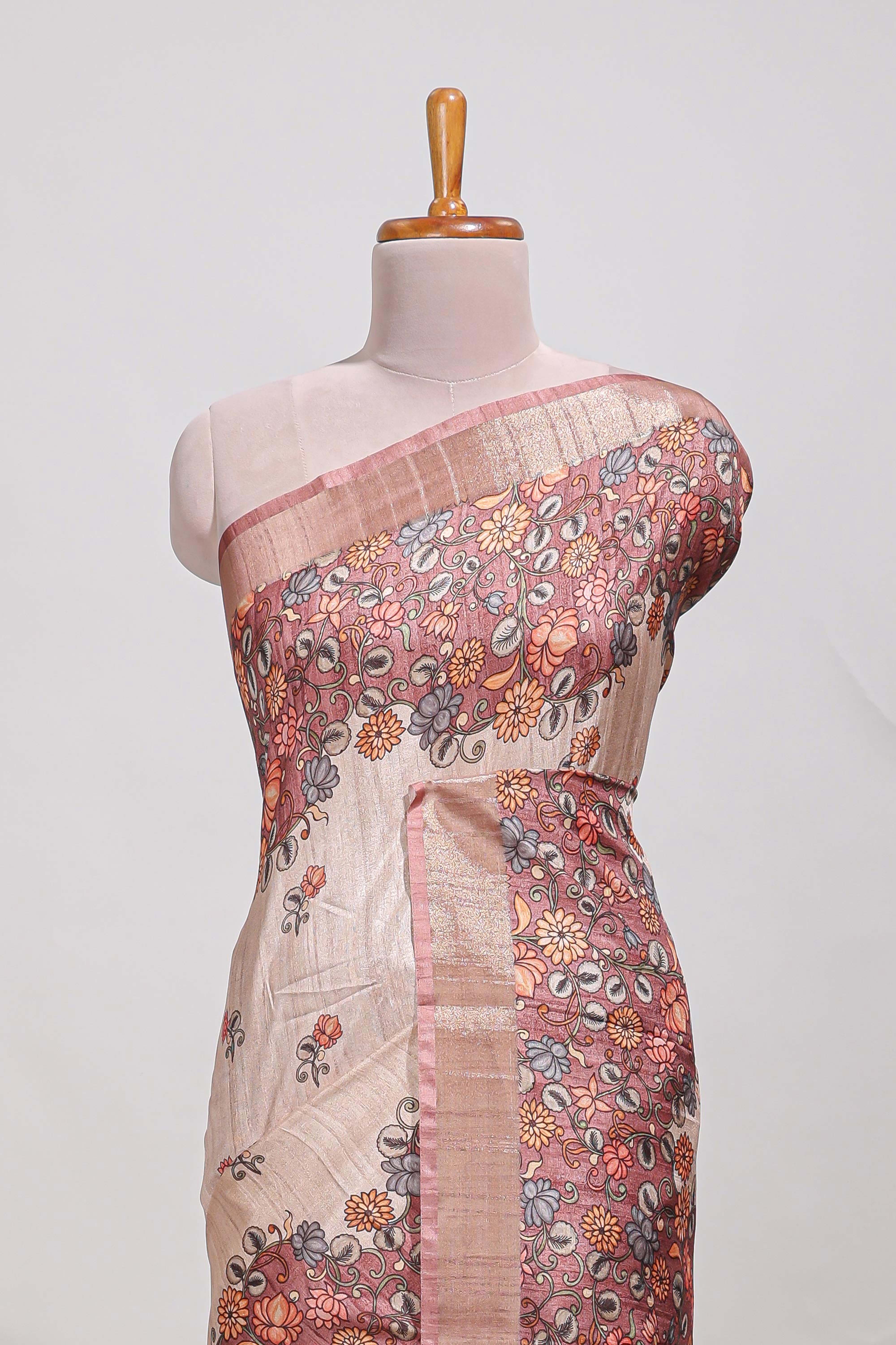 Beige floral semi art tussar saree with floral contrast border pallu and contrast blouse