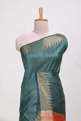 Green semi tussar saree allzariwork with zaritemple border and contrast blouse