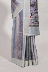 Multi colour kalamakri tussar sareewith floral creeper prints zari border and kalamkari peacock motif print pallu