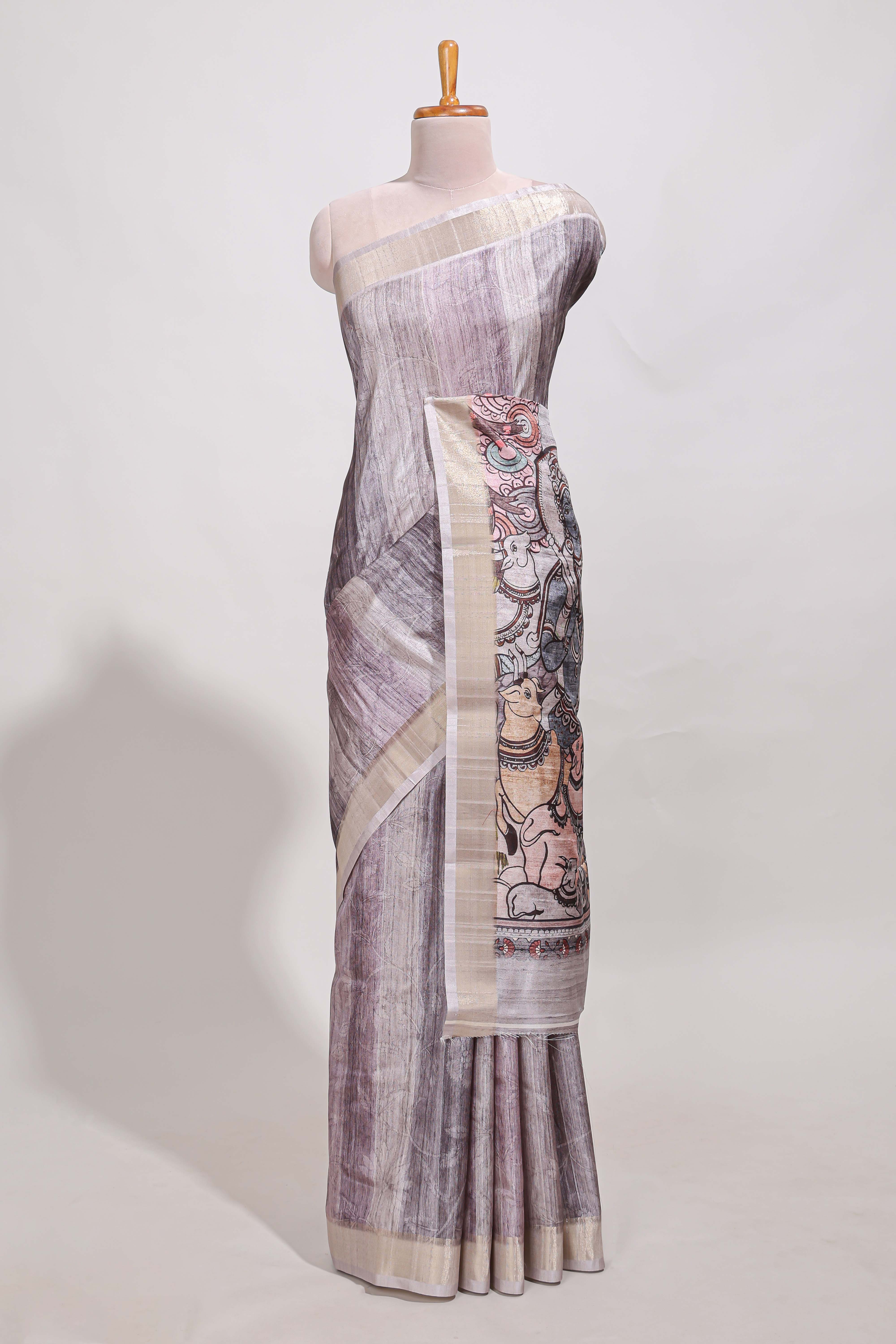 kalamakri arttussar sareewith floral creeper prints zari border and kalamkari peacock motif print pallu