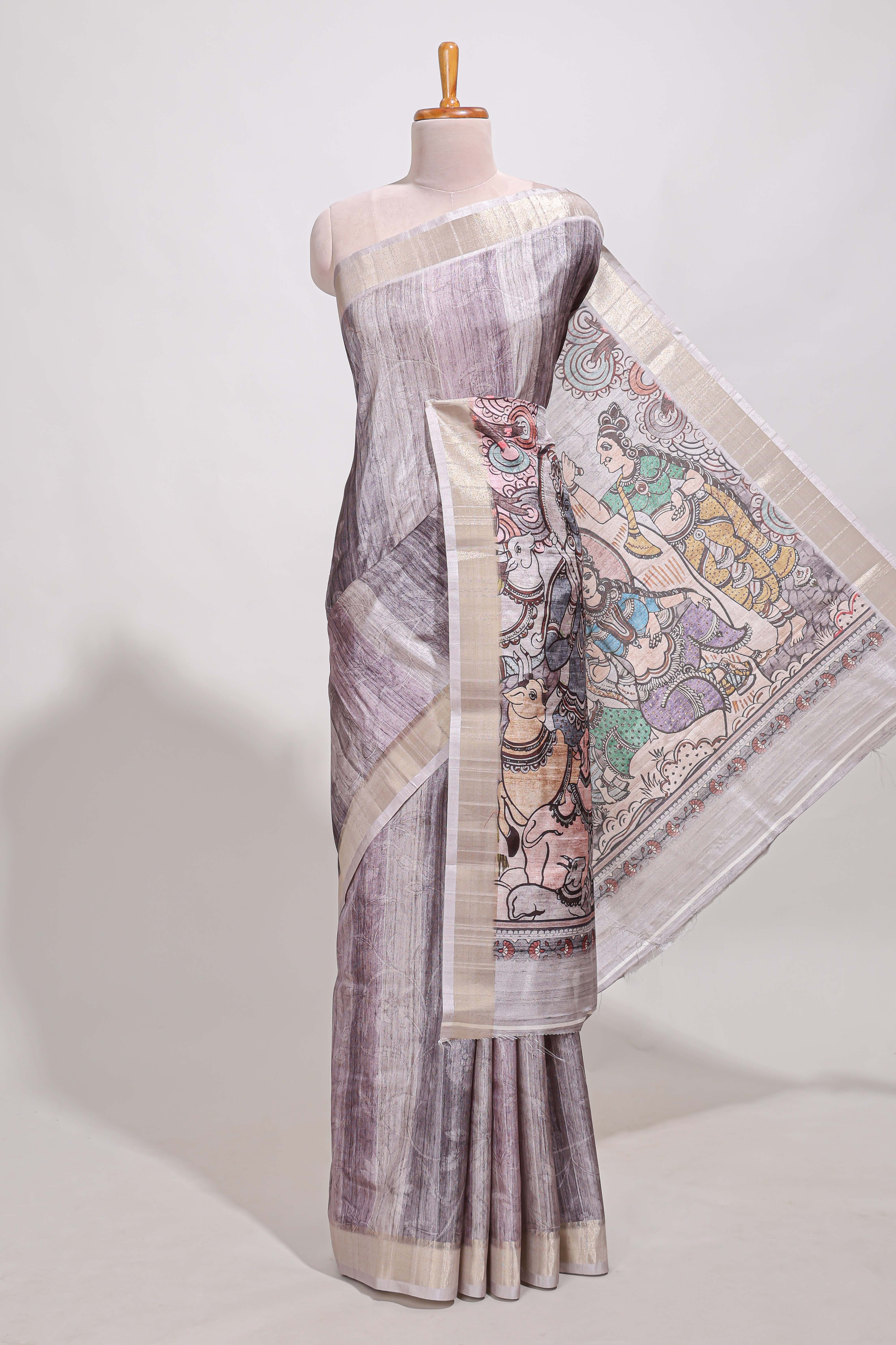 kalamakri arttussar sareewith floral creeper prints zari border and kalamkari peacock motif print pallu