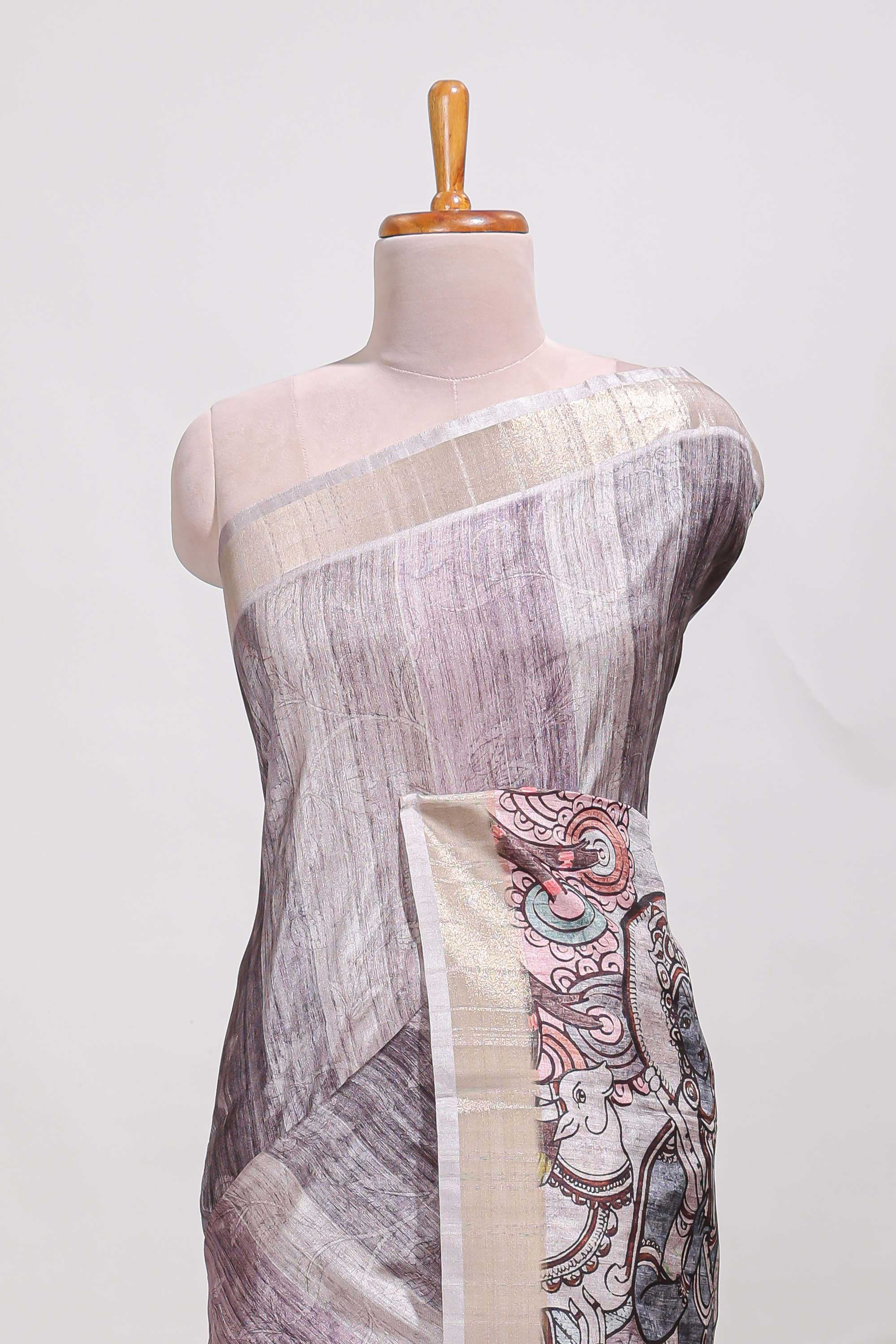 kalamakri arttussar sareewith floral creeper prints zari border and kalamkari peacock motif print pallu