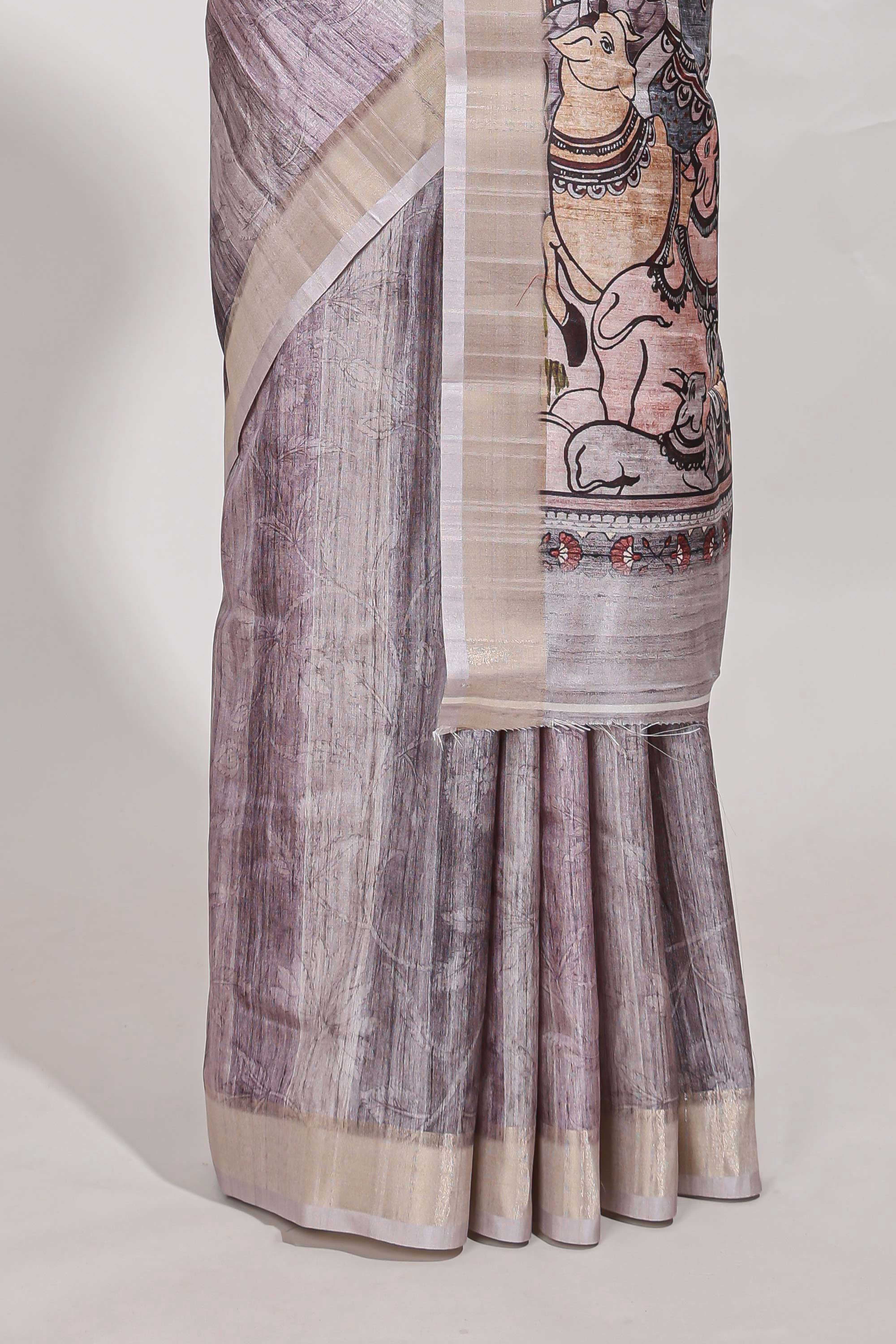 kalamakri arttussar sareewith floral creeper prints zari border and kalamkari peacock motif print pallu