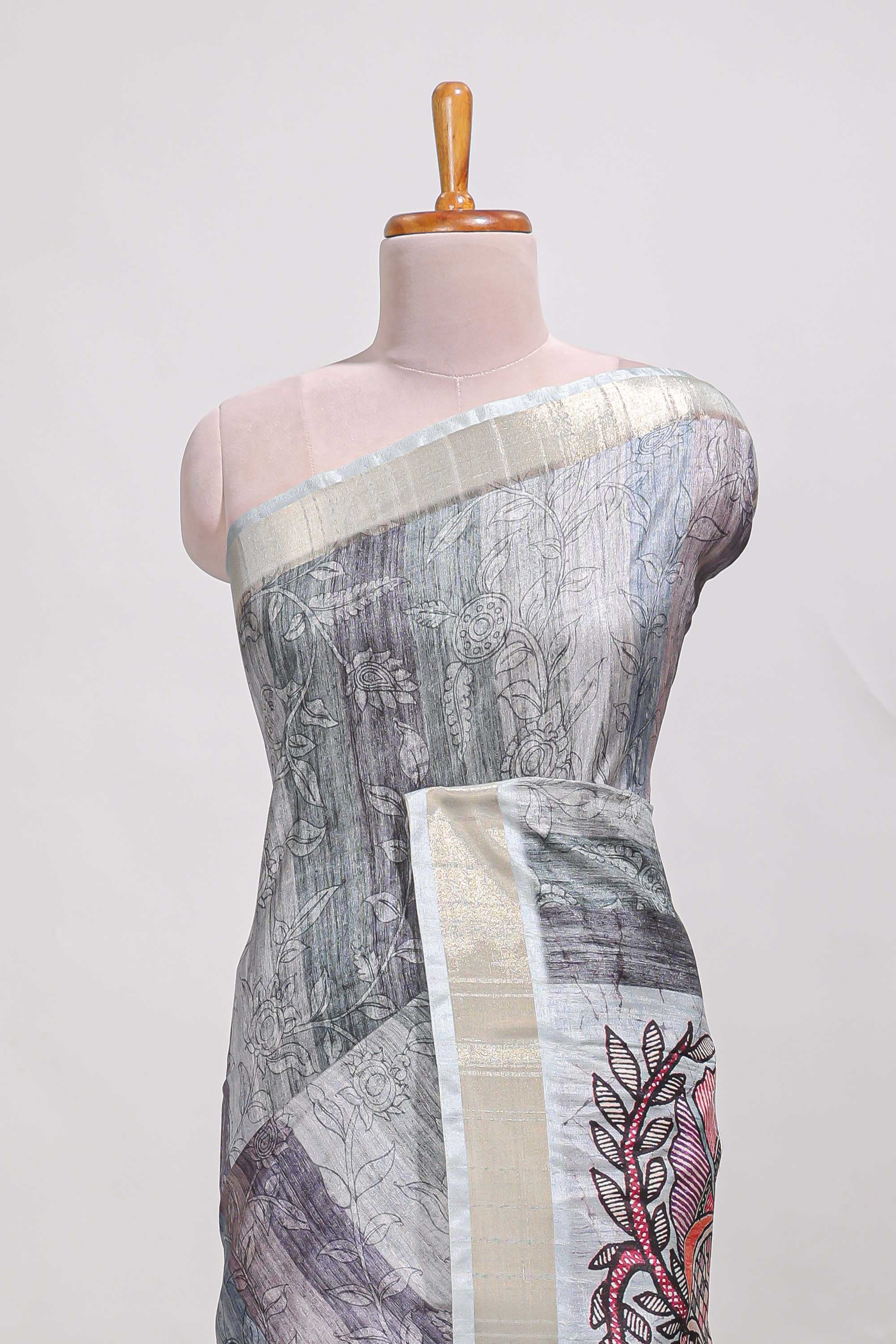 Green kalamakri arttussar sareewith floral creeper prints zari border and kalamkari peacock motif print pallu