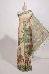 Beige colour semi tussar saree with contrast leafborder and nature art pallu with contrast blouse