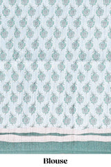 Green colour floral printedsemi tussar saree with creeperborder and matching printed blouse