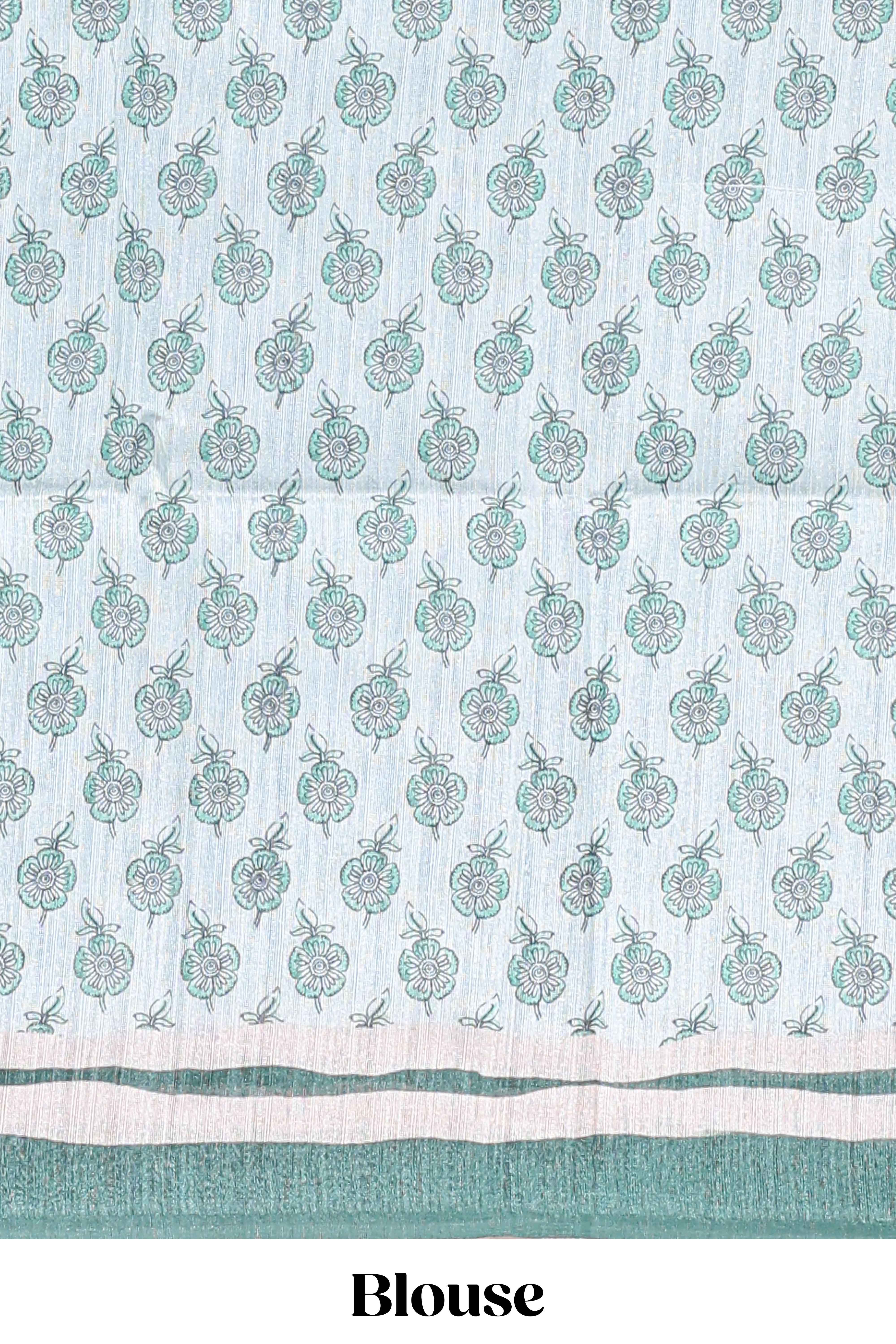 Green colour floral printedsemi tussar saree with creeperborder and matching printed blouse