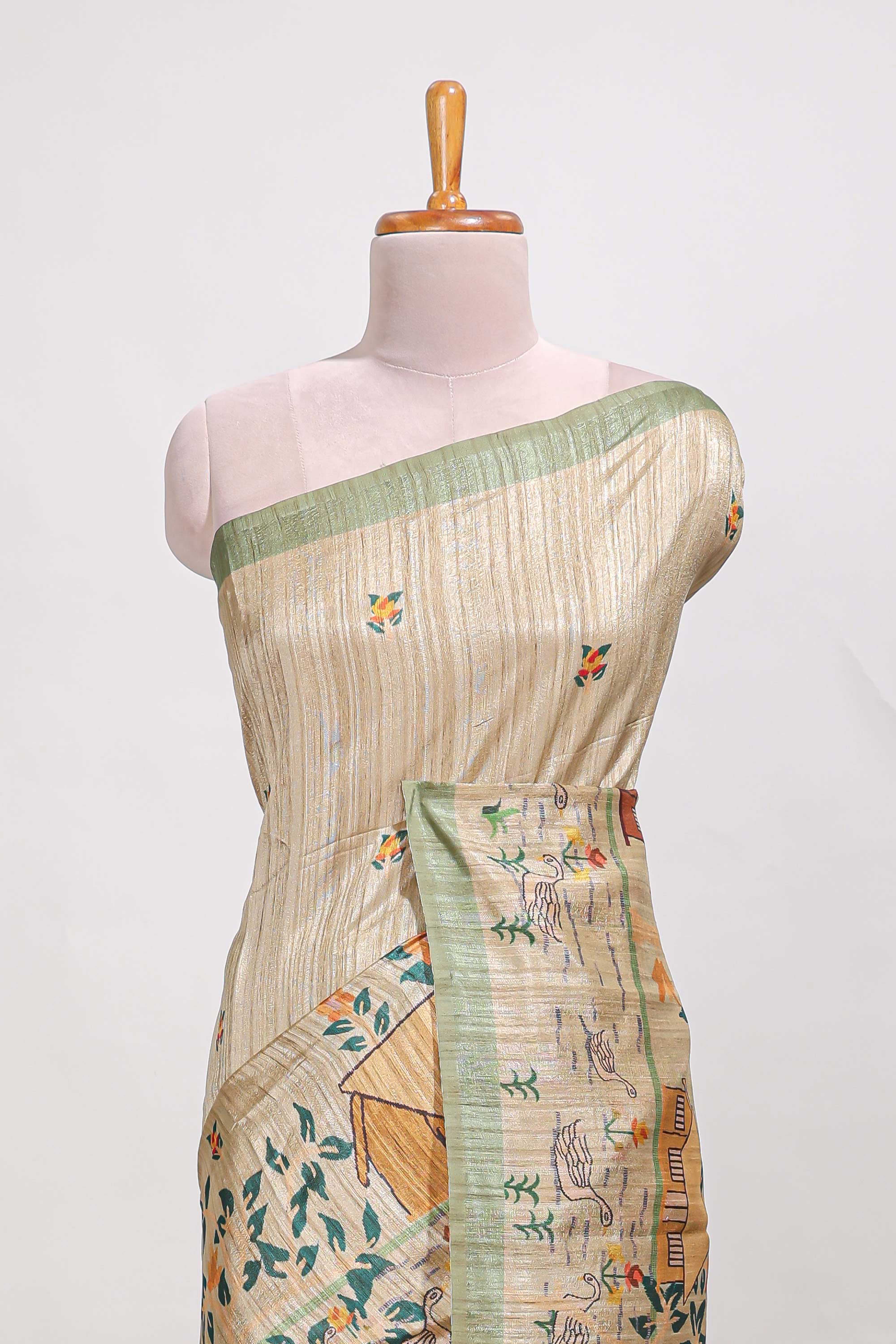 pastel green artistic village art tussar saree with small border and matching pallu