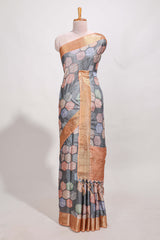 Grey geometrical tussar silk saree multi coloured honeycomb geomatricpatterns rich matching pallu along with tassles
