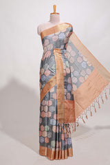 Grey geometrical tussar silk saree multi coloured honeycomb geomatricpatterns rich matching pallu along with tassles