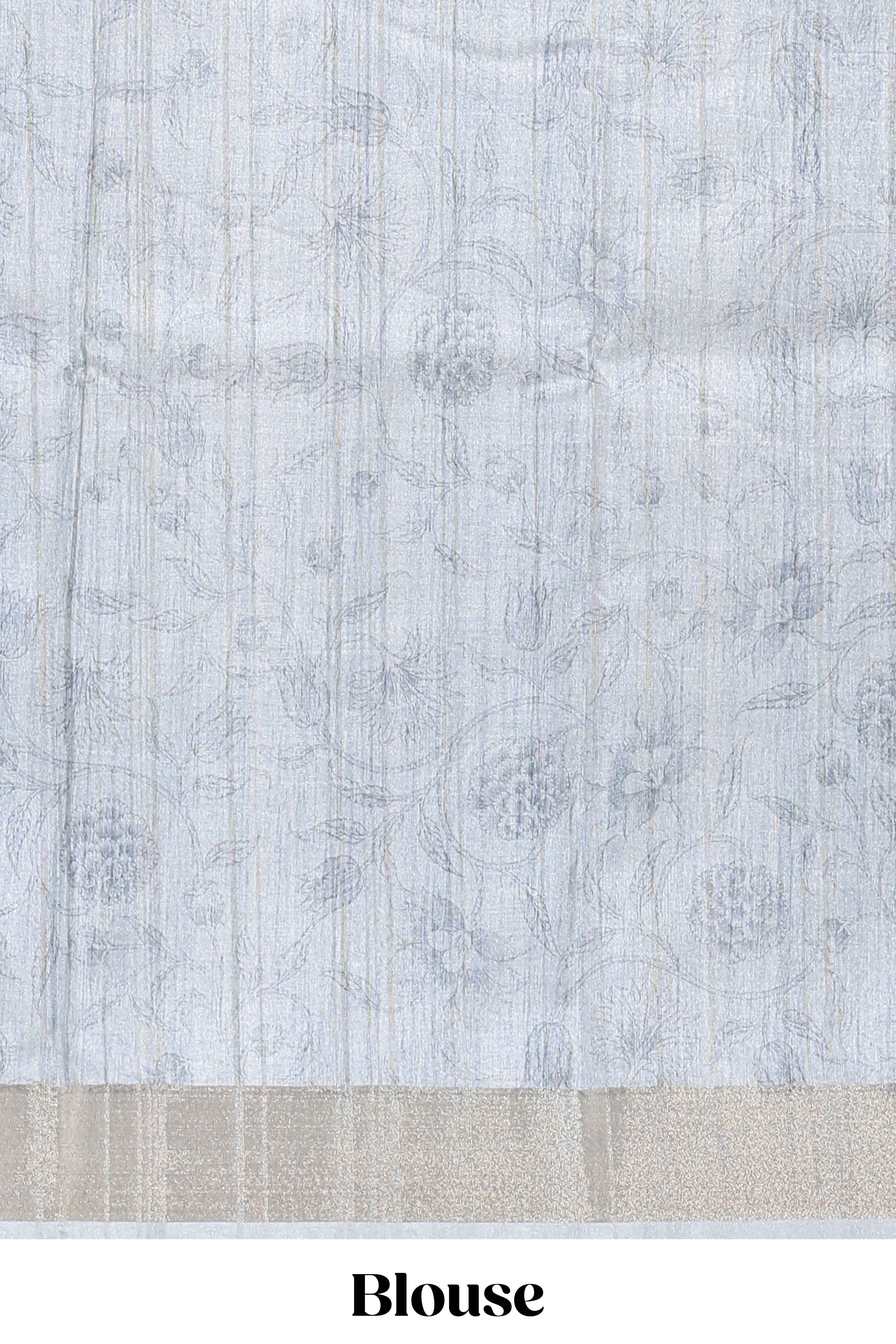 Grey kalamakri arttussar sareewith floral creeper prints zari border and dancing figures print pallu