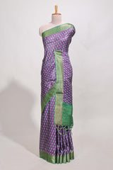 Violet semi tussar saree with contrast coper gold zari border and contrast blouse