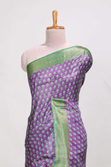 Violet semi tussar saree with contrast coper gold zari border and contrast blouse