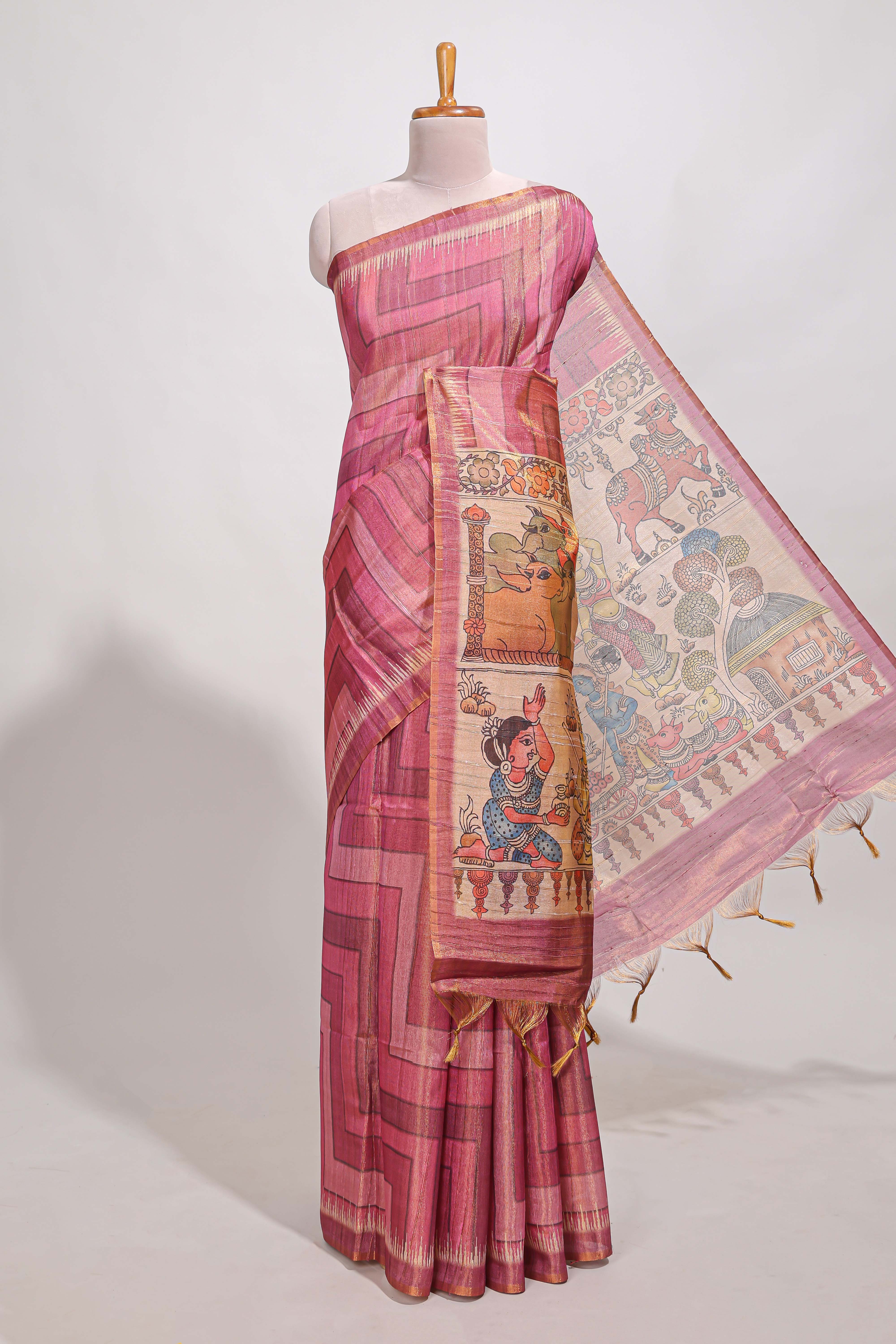 Magenta abstract print tussar saree with village and pichwai pallu and self print blouse along with tassels