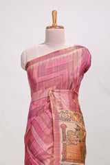 Magenta abstract print tussar saree with village and pichwai pallu and self print blouse along with tassels