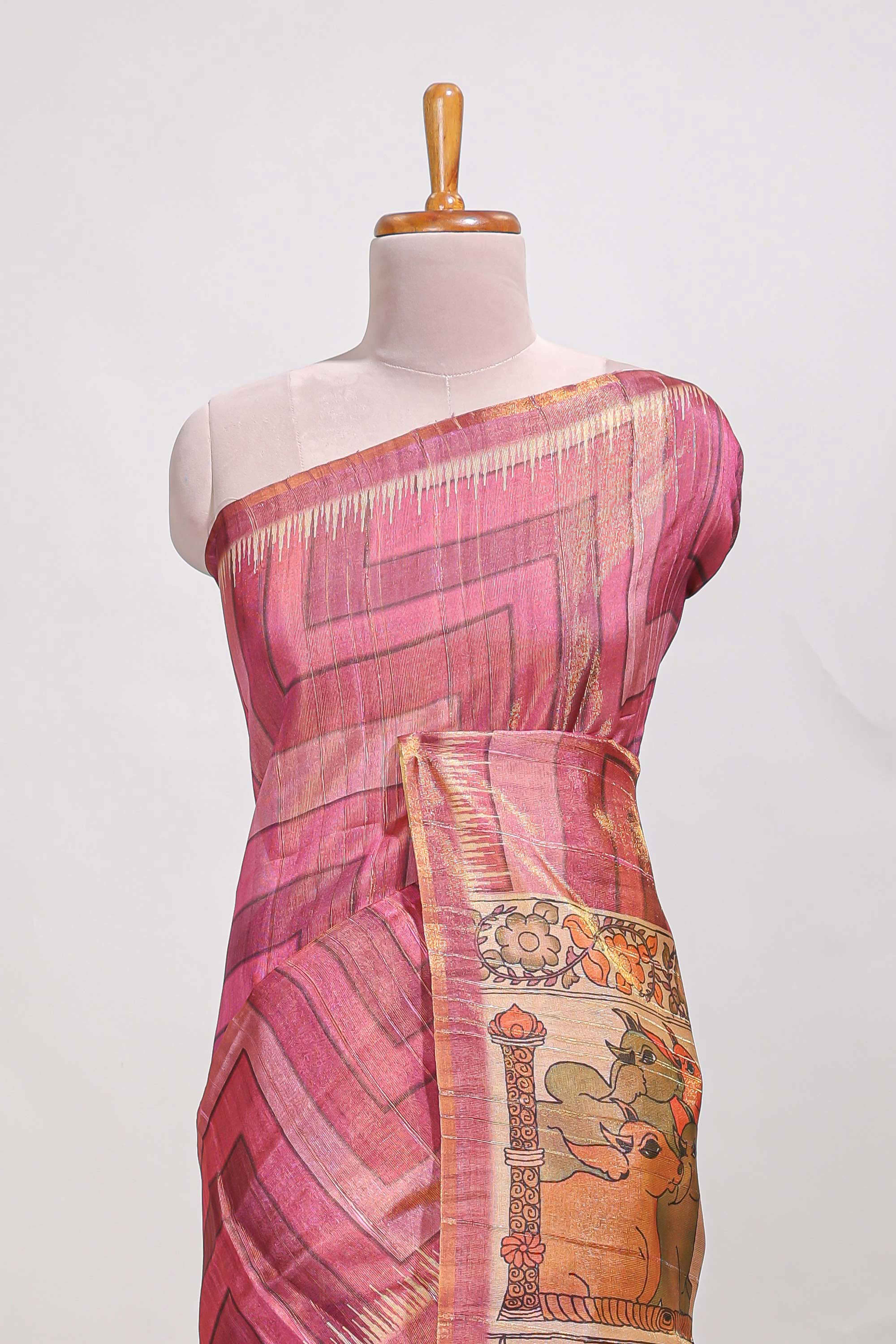 Magenta abstract print tussar saree with village and pichwai pallu and self print blouse along with tassels