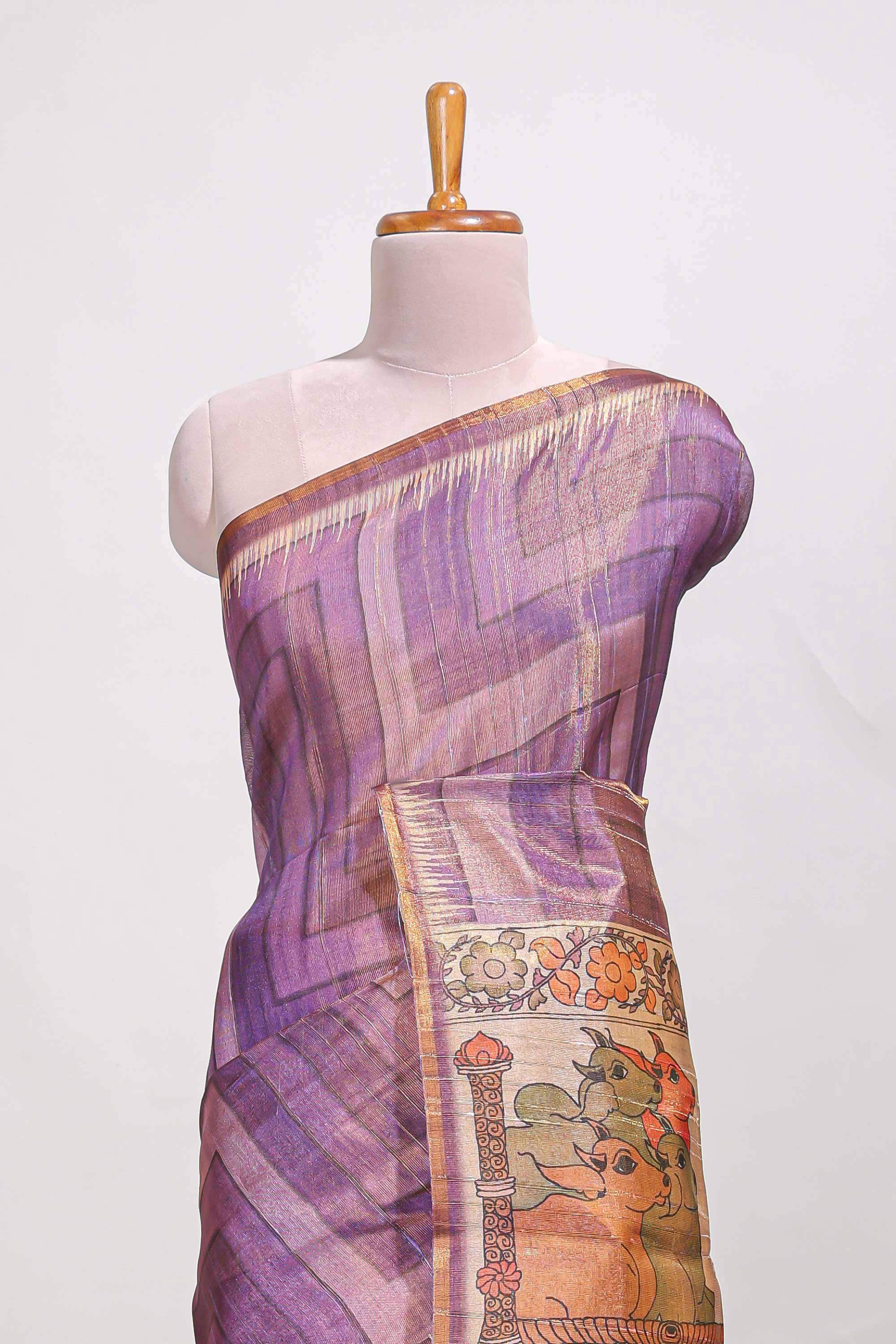 Violet abstract print tussar saree with village and pichwai pallu and self print blouse along with tassels