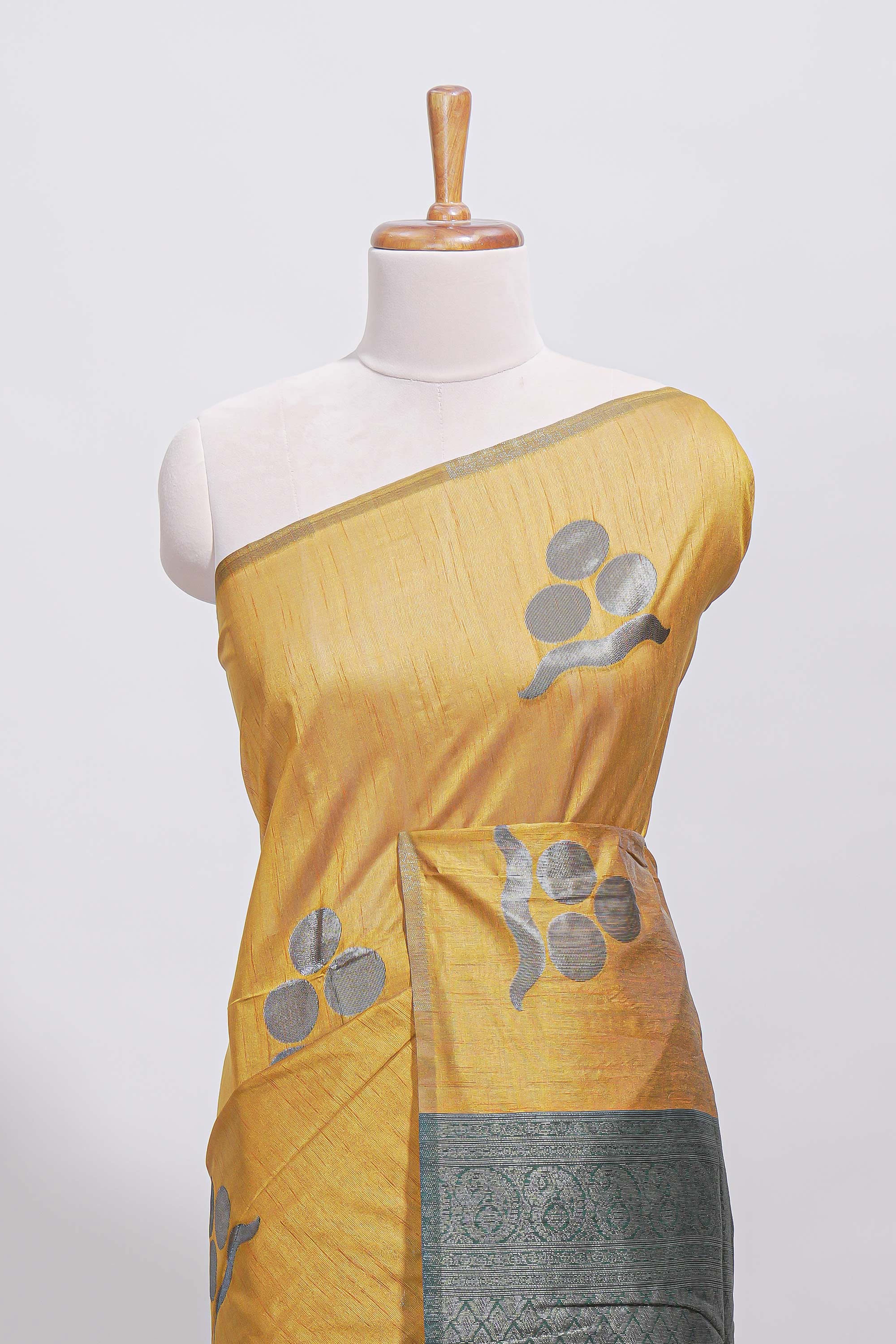 Borderless yellow round butta art tussar saree with contrast pallu and blouse