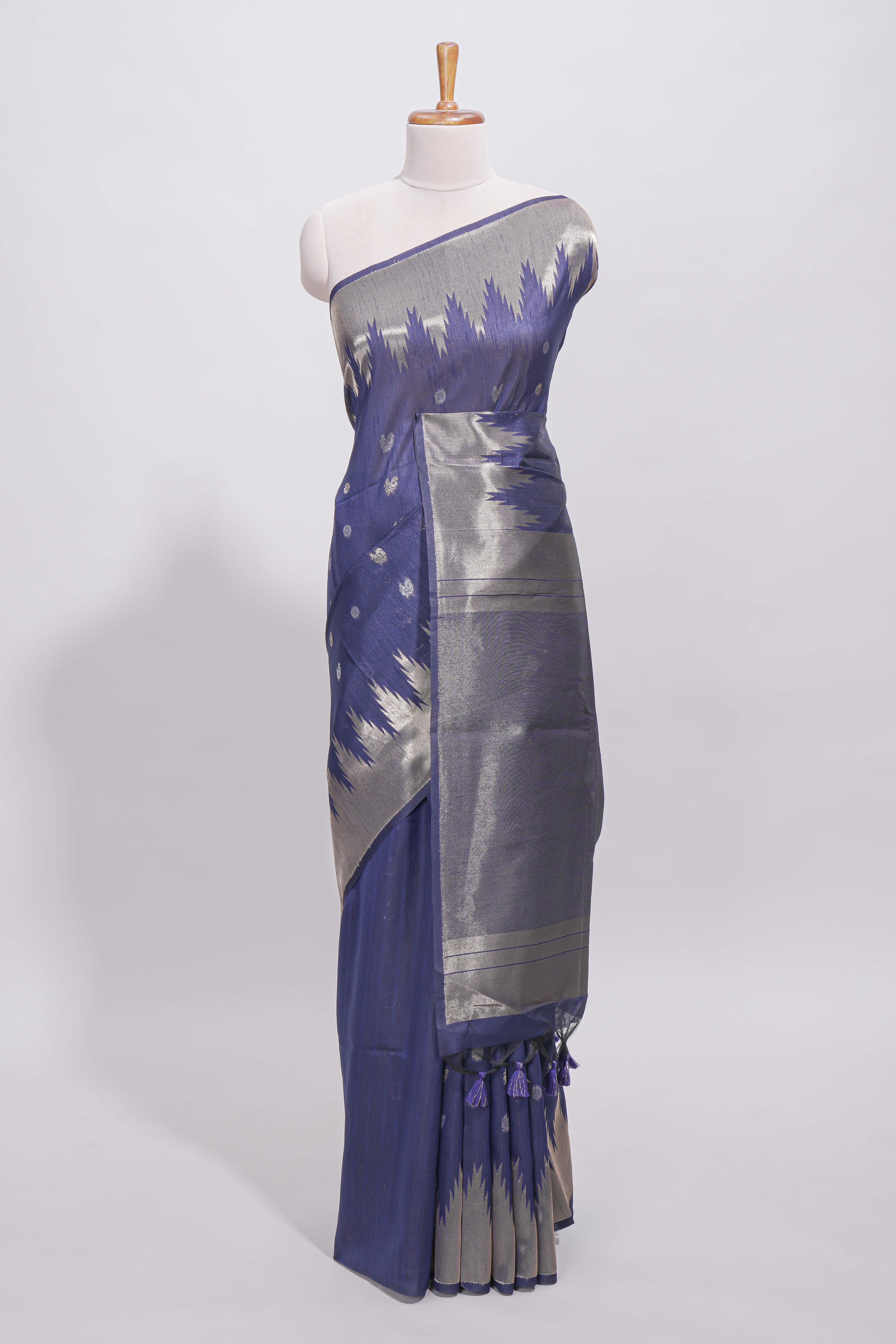 Blue ikkat style silver zari butta art tussar saree with self zari temple design border and matching blouse