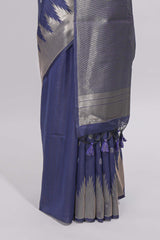 Blue ikkat style silver zari butta art tussar saree with self zari temple design border and matching blouse
