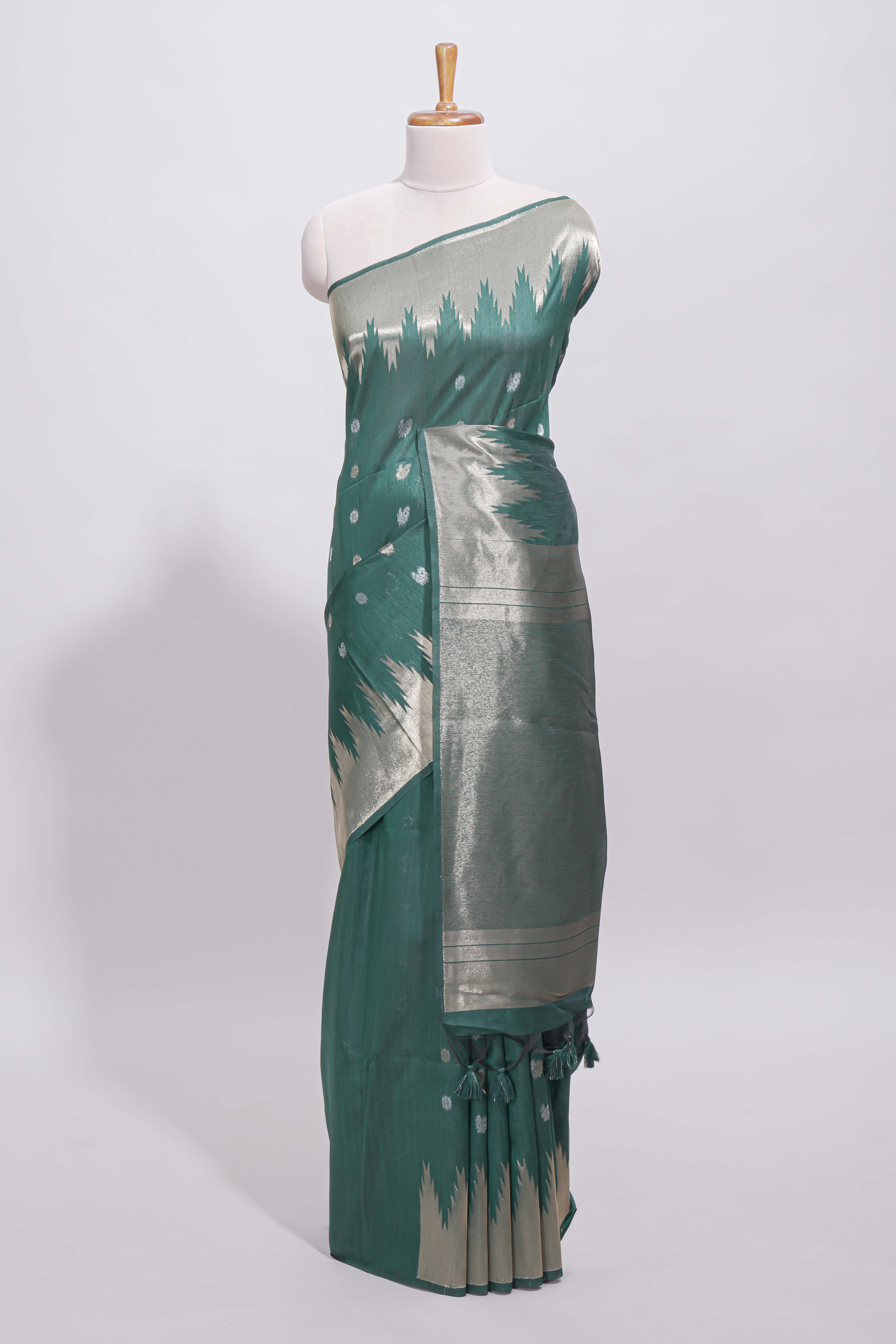 Green ikkat style silver zari butta art tussar saree with self zari temple design border and matching blouse