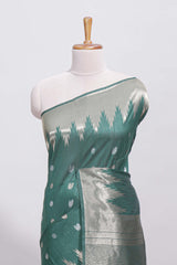 Green ikkat style silver zari butta art tussar saree with self zari temple design border and matching blouse