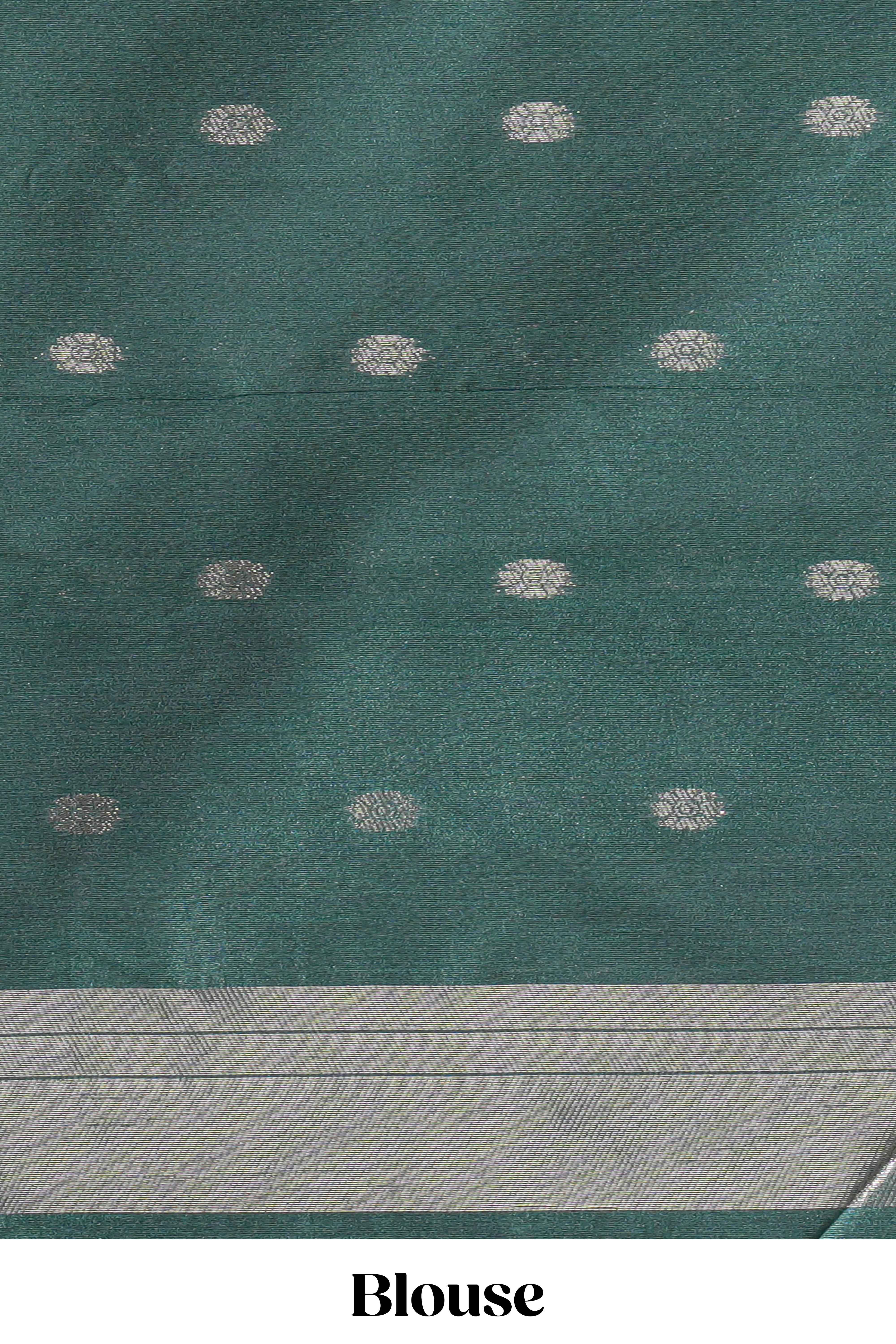 Green ikkat style silver zari butta art tussar saree with self zari temple design border and matching blouse
