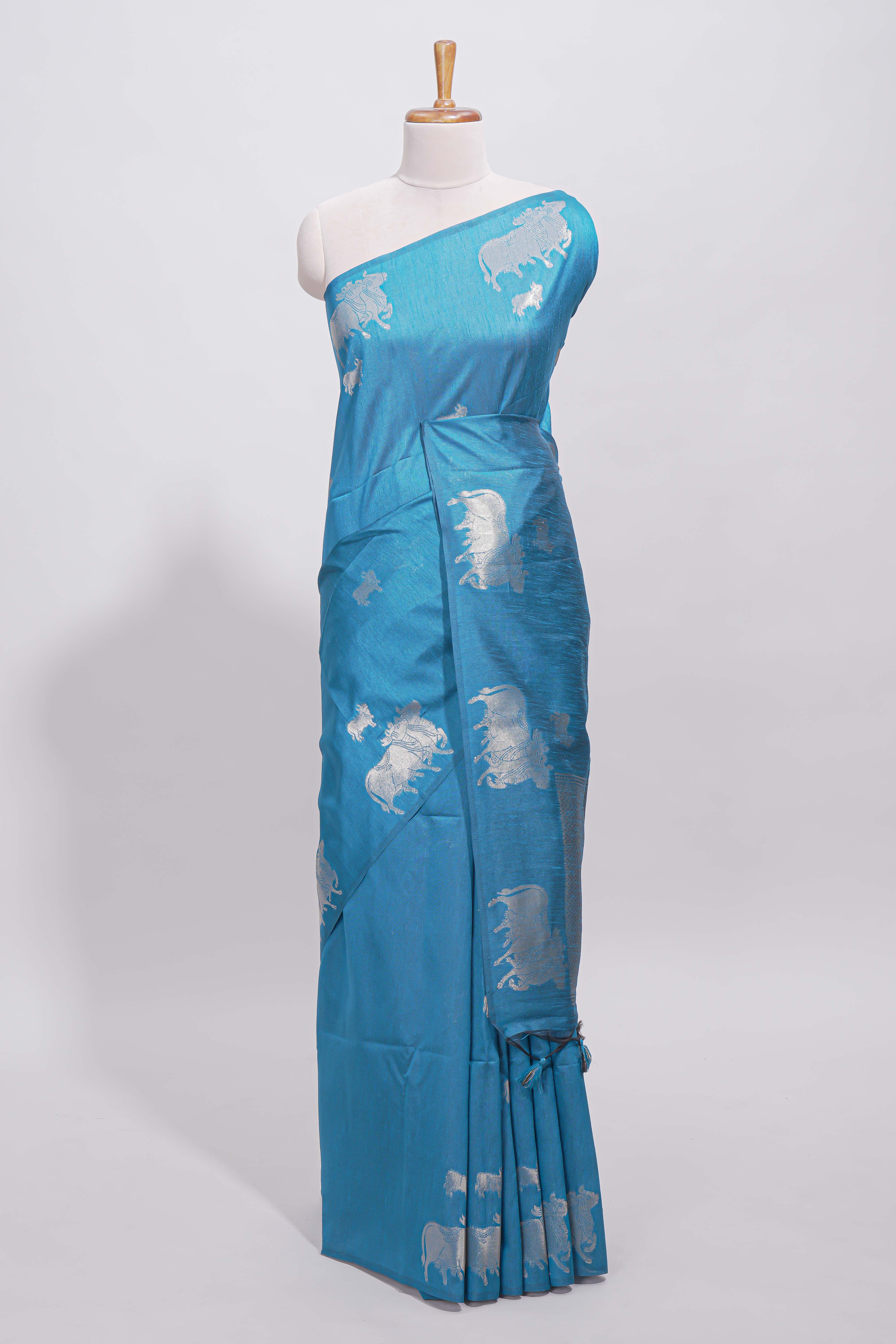 Borderless blue cow design silver zari butta art tussar saree with matching blouse
