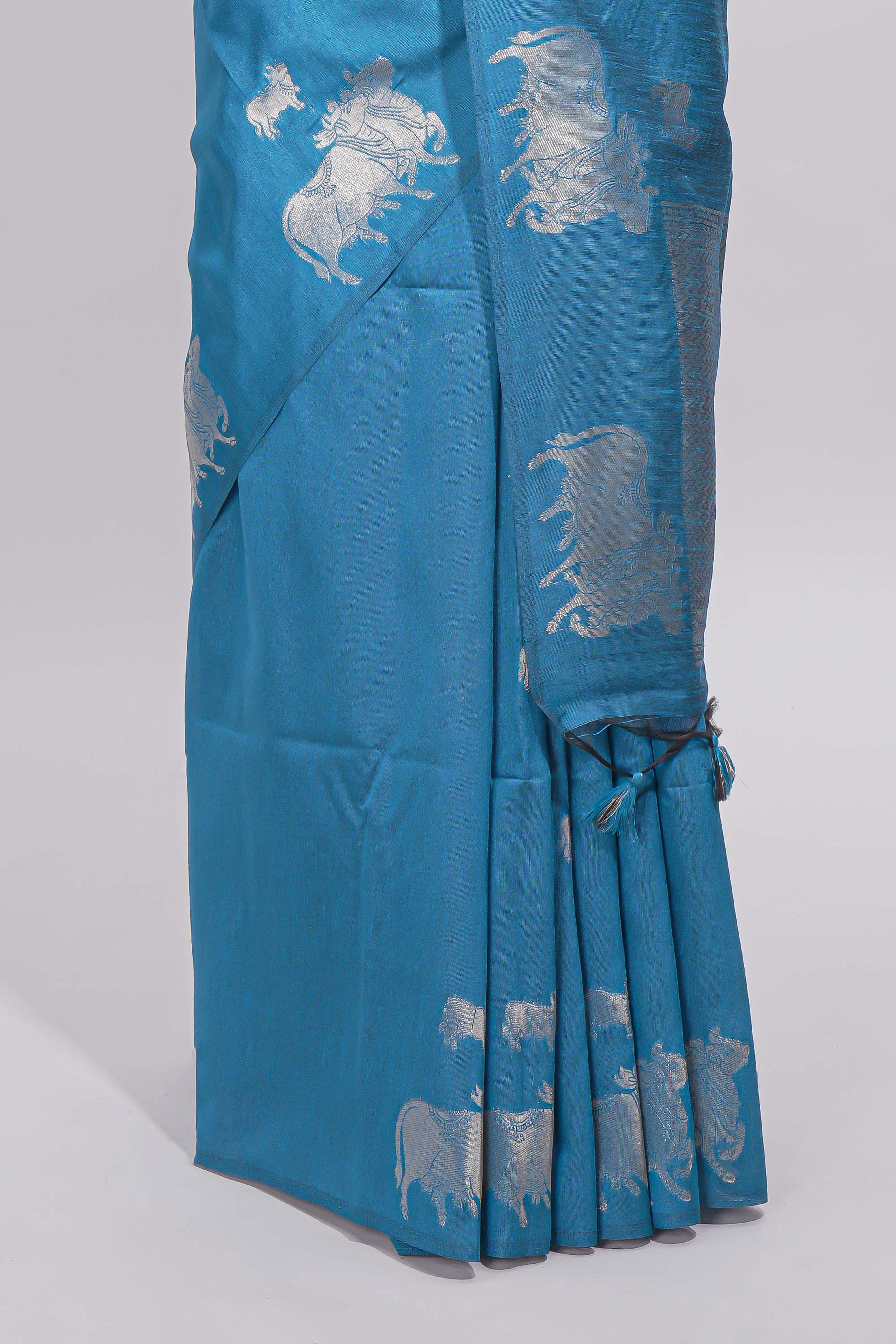 Borderless blue cow design silver zari butta art tussar saree with matching blouse
