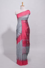 Grey plain art tussar saree with contrast border and striped pallu