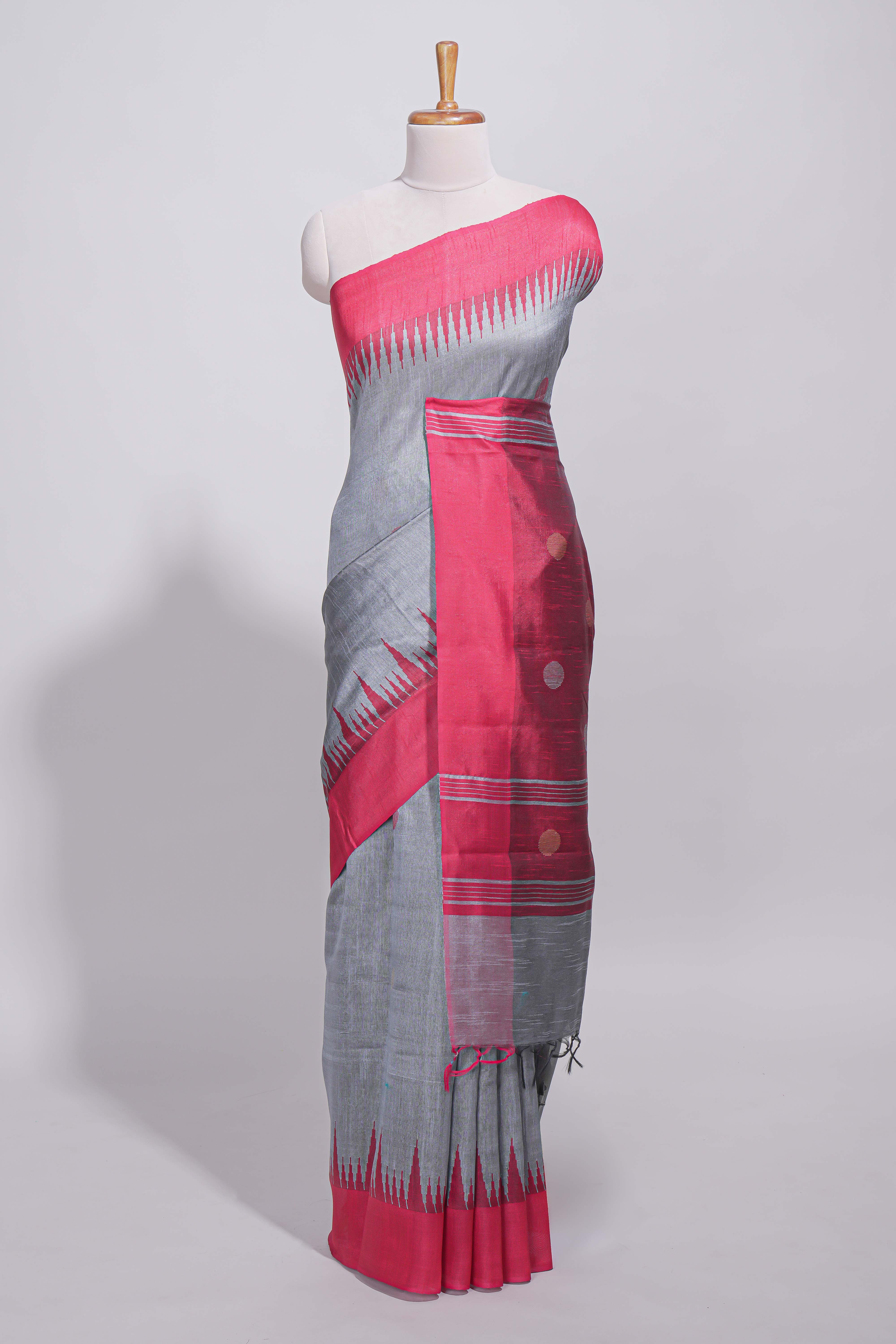 Grey plain art tussar saree with contrast border and striped pallu