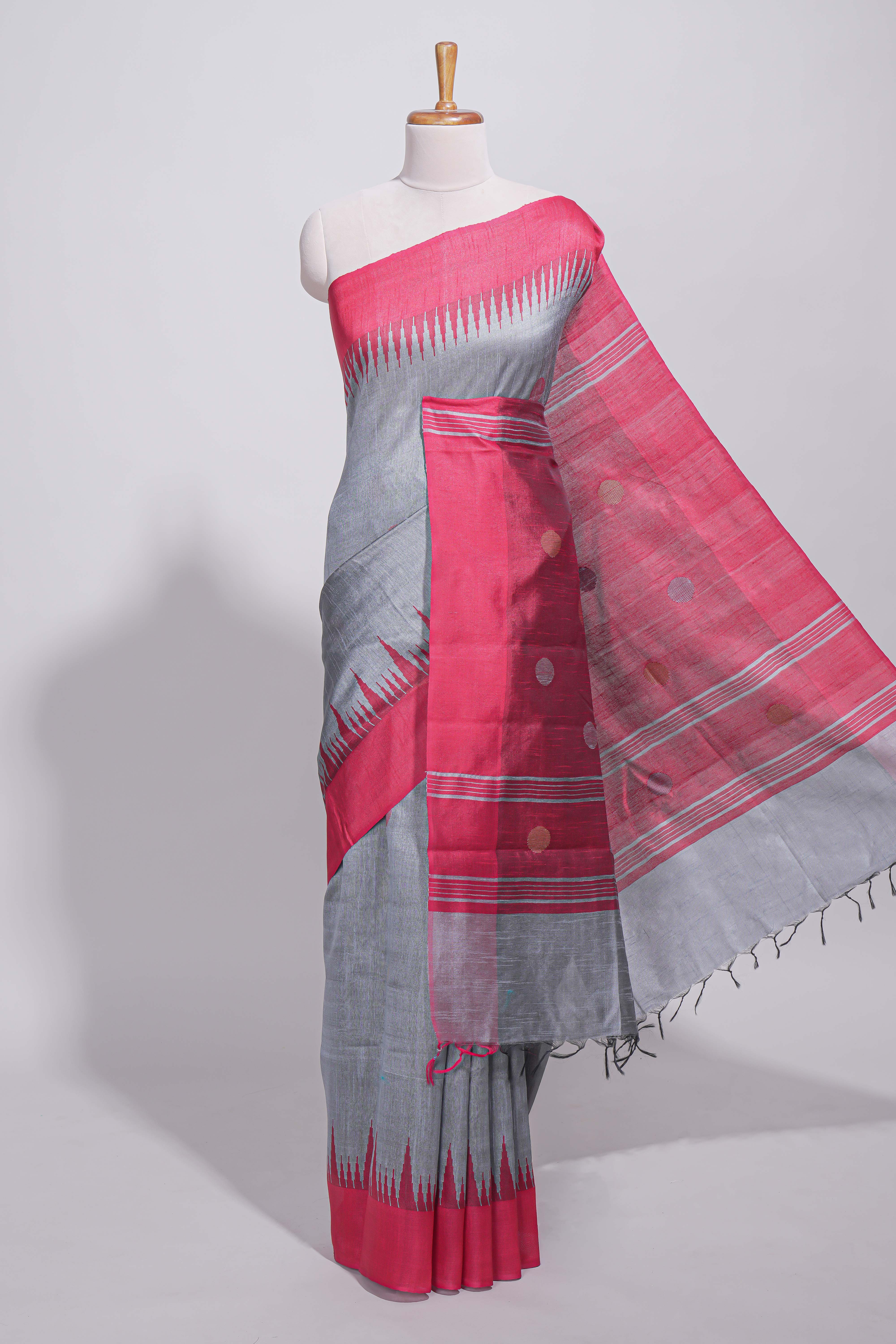 Grey plain art tussar saree with contrast border and striped pallu