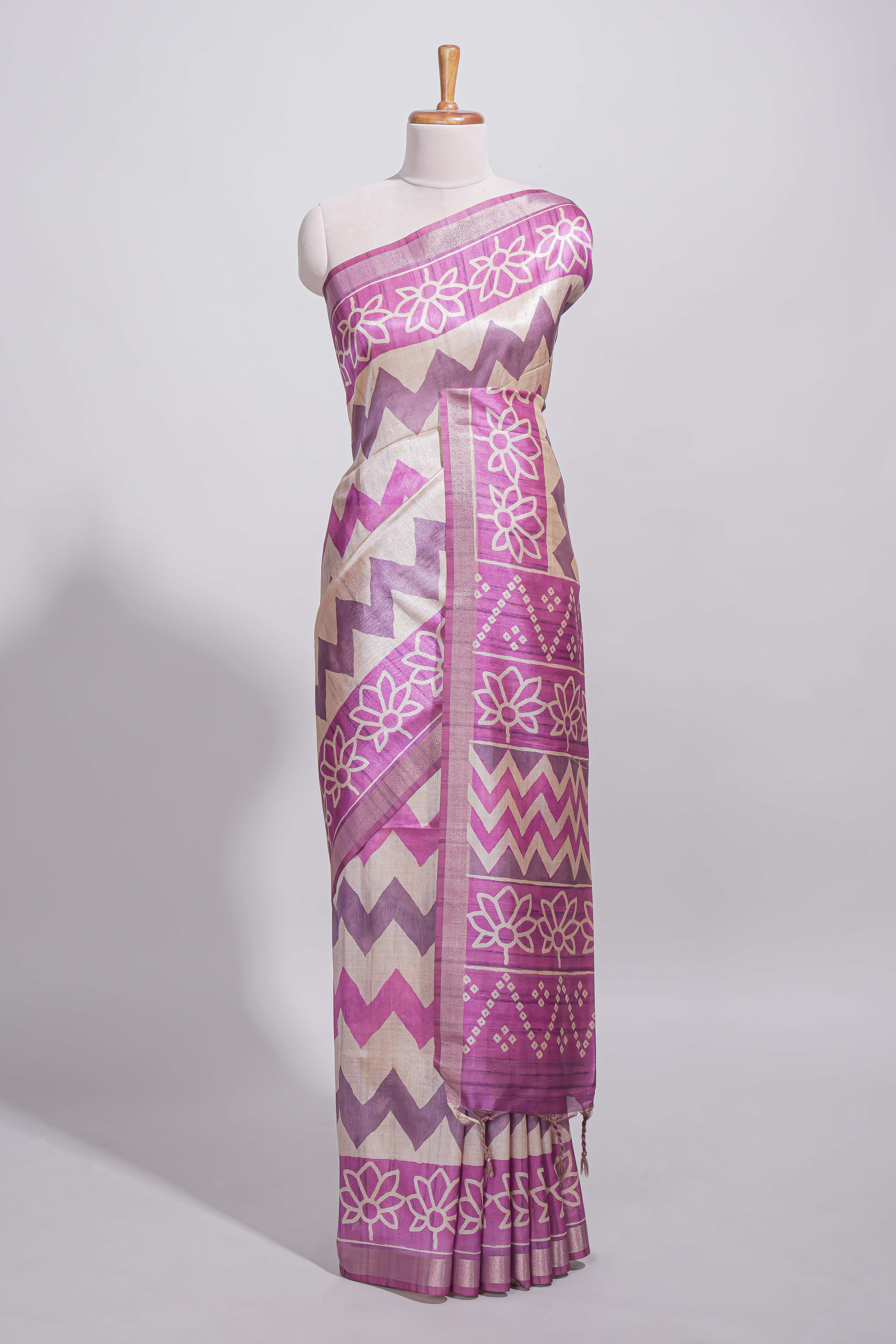 Purple color tussar saree body chevron prints floral motifs and printed pallu along with matching blouse