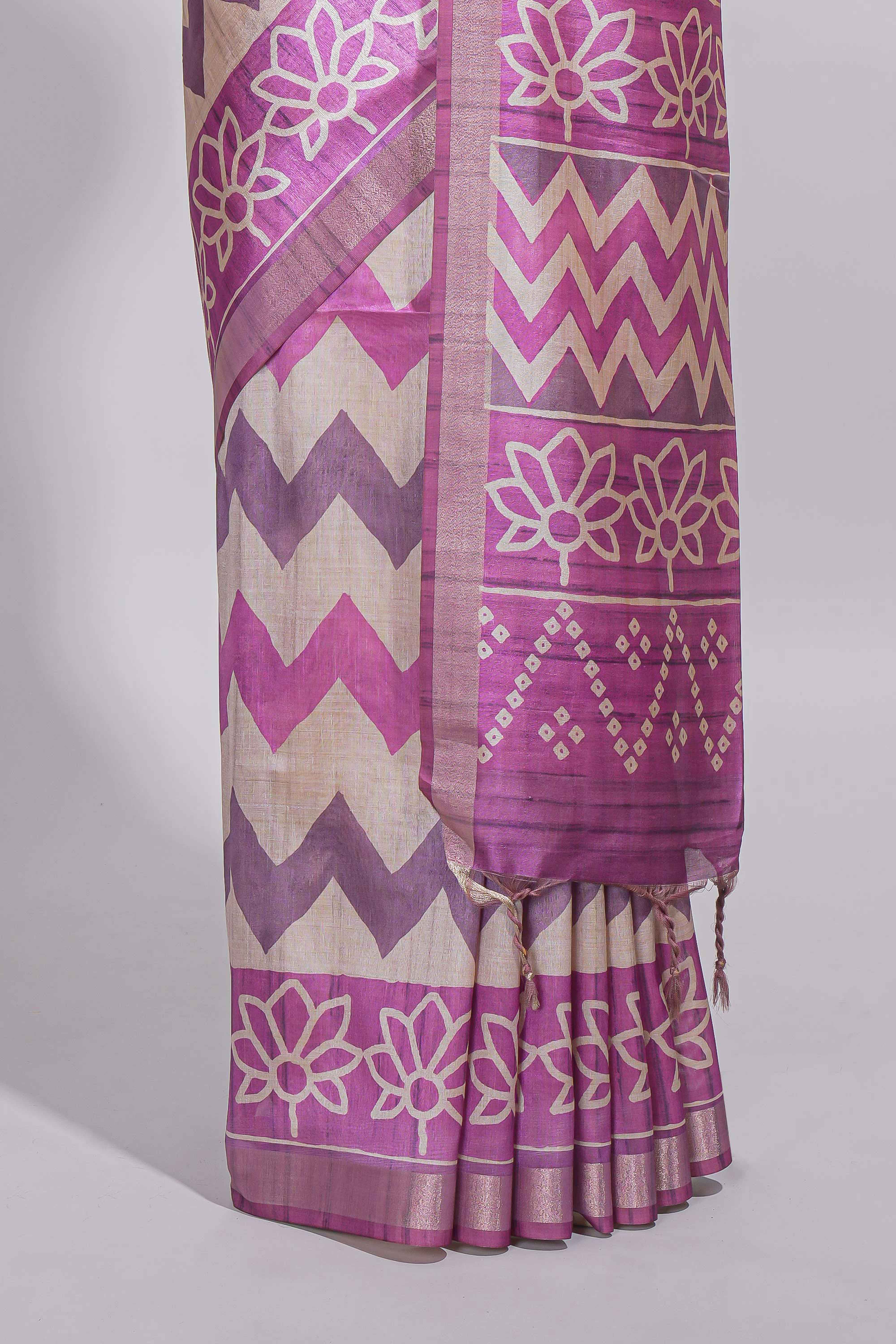 Purple color tussar saree body chevron prints floral motifs and printed pallu along with matching blouse