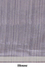 Grey and ivory color tussar saree body chevron prints floral motifs and printed pallu along with matching blouse