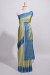 Green tussar saree with woven checks by rich blue border and matching zari woven pallu with contrast blouse piece
