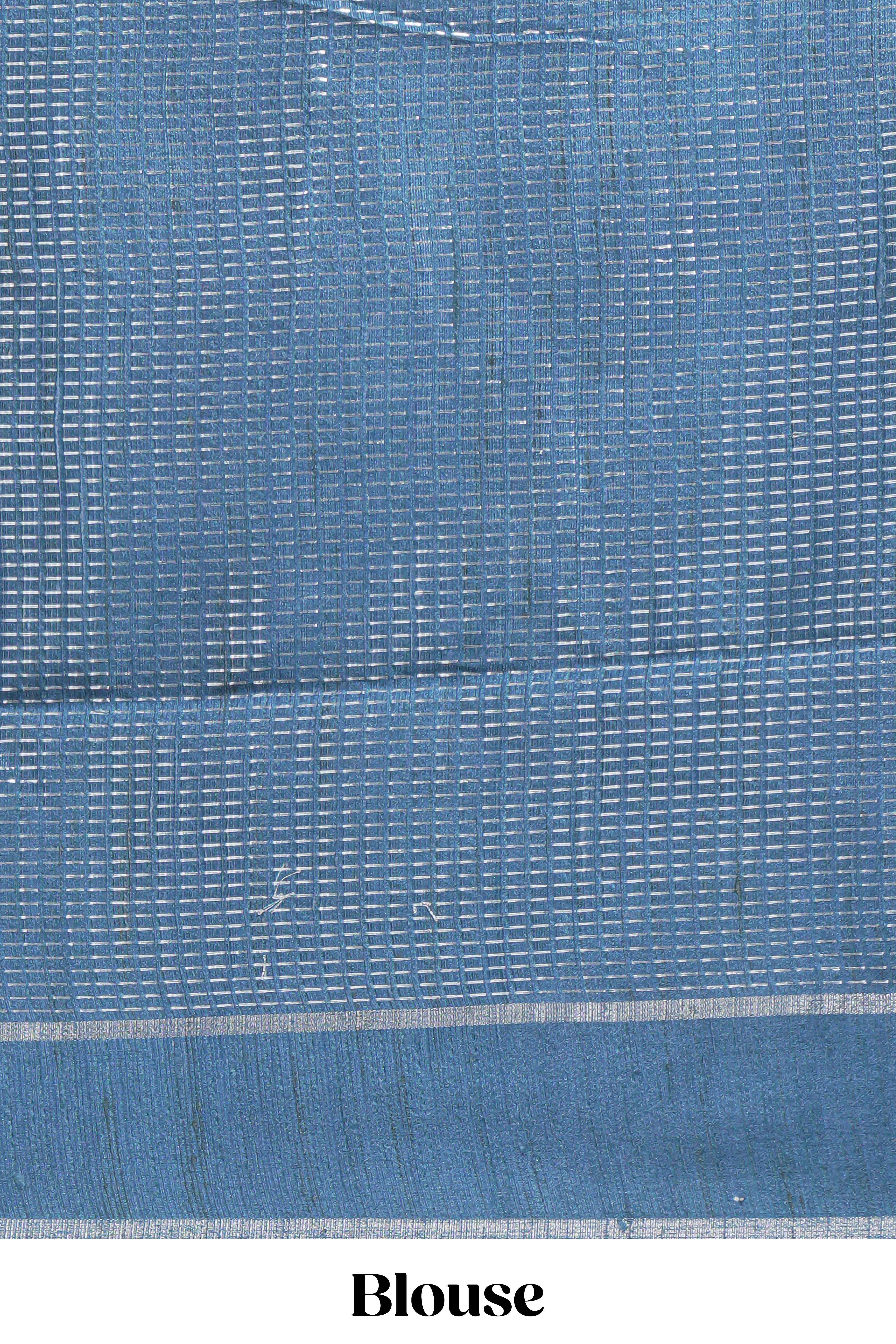 Green tussar saree with woven checks by rich blue border and matching zari woven pallu with contrast blouse piece